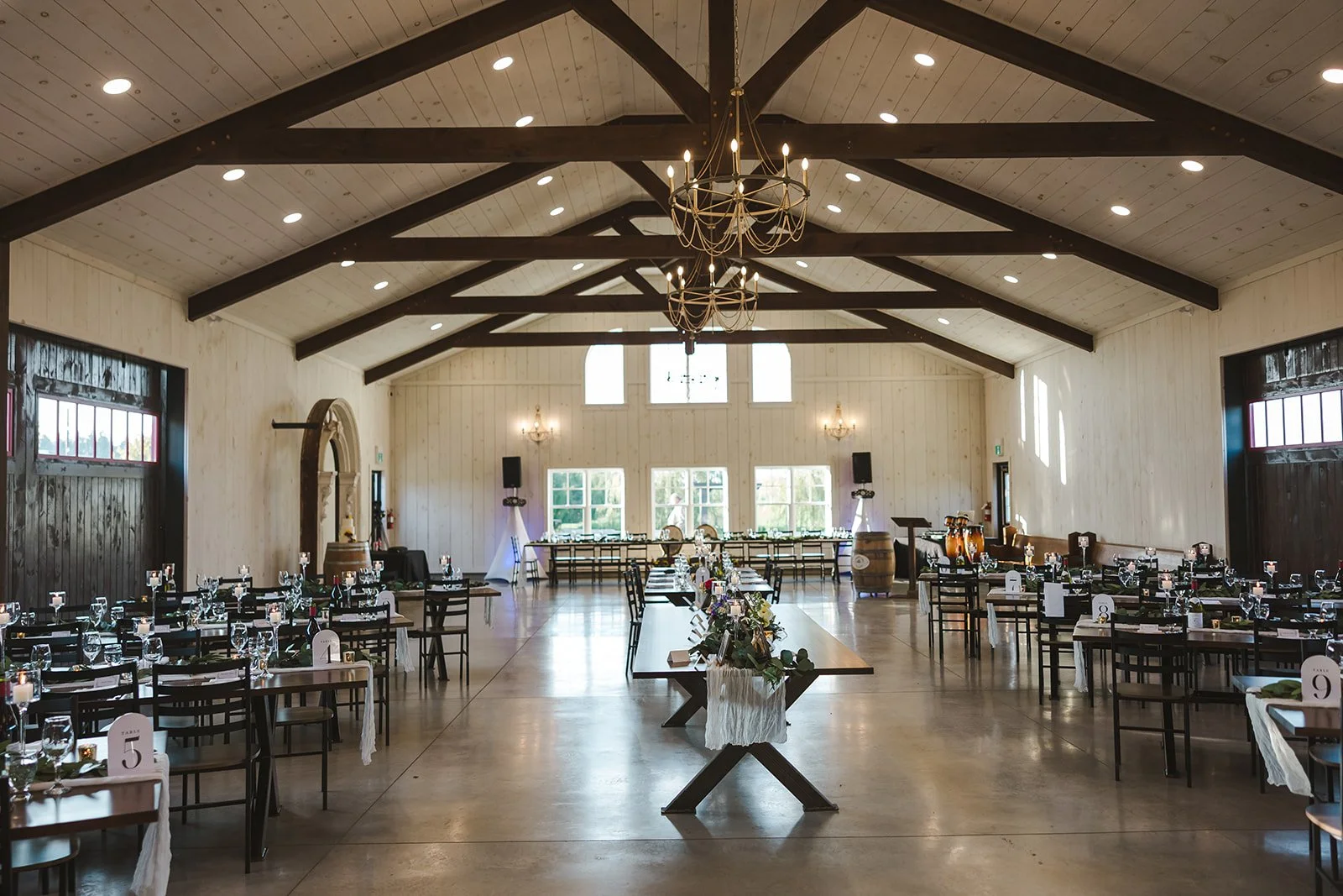 Rustic wedding reception space  Barn Swallows at Thatcher Farm  Fedora Media .jpg
