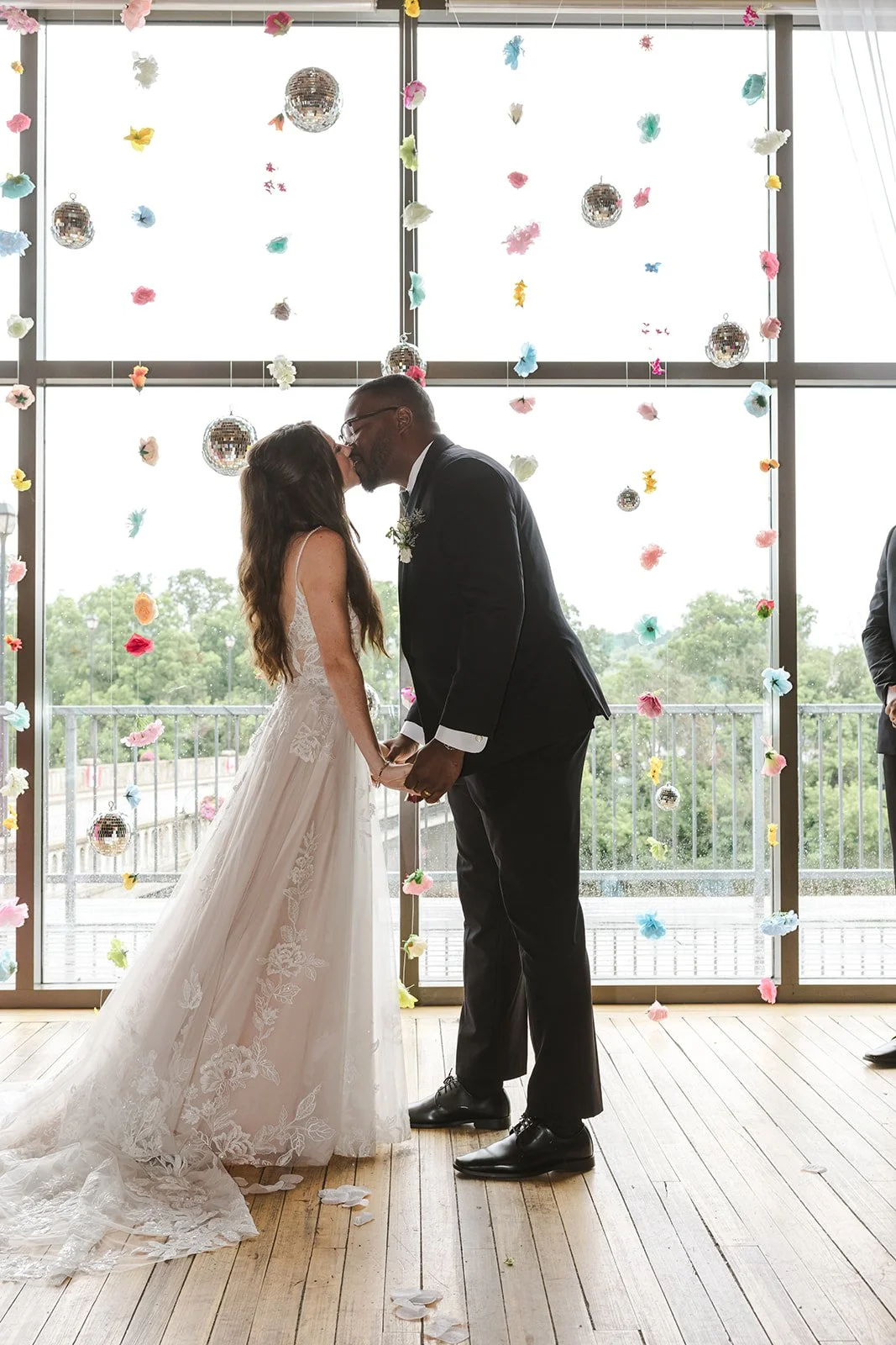 Bride and groom kissing disco ball  River's Edge  Arlington Hotel  Paris, ON  Fedora Media.jpg