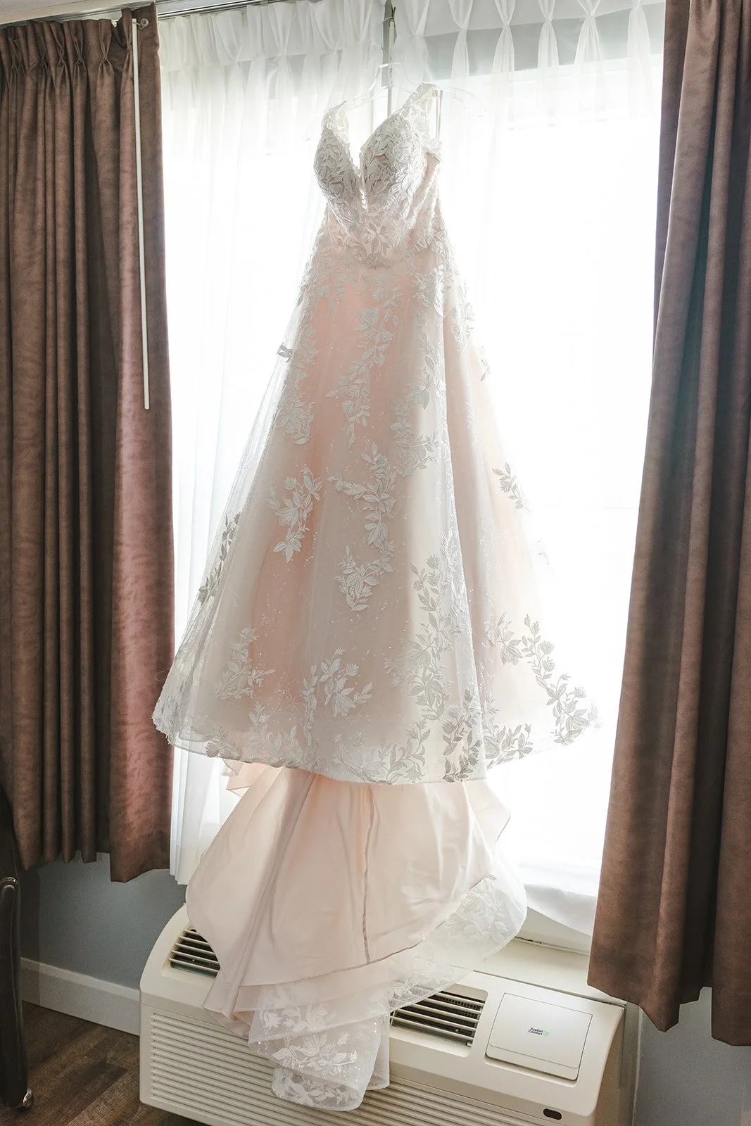 Wedding Dress Hanging In Window  Cambridge, ON  Fedroa Media.jpg