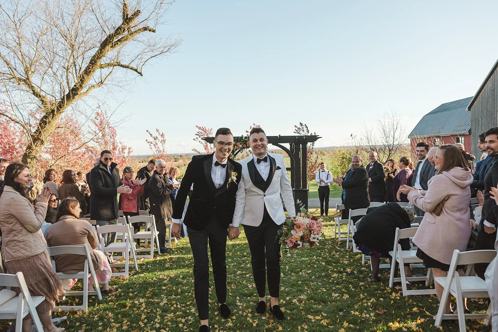 Grooms walking down the wedding aisle together  Earth to Table  Hamilton, ON  Fedora Media.jpg