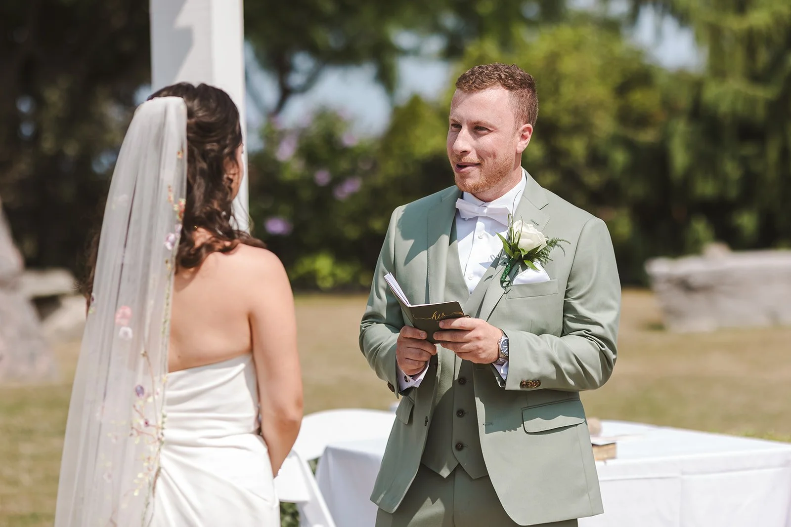 Groom reading vows  Hamilton, ON  Fedora Media.jpg