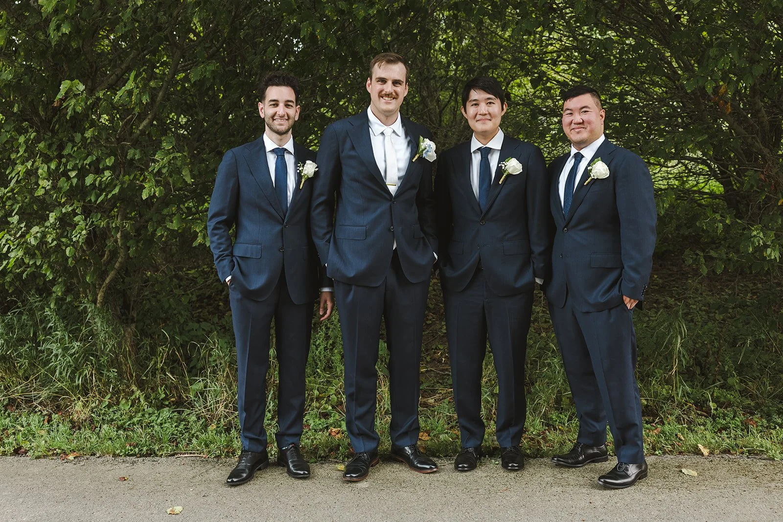 Groom with groomsmen  Carmen's Hotel  Hamilton, ON  Fedora Media.jpg