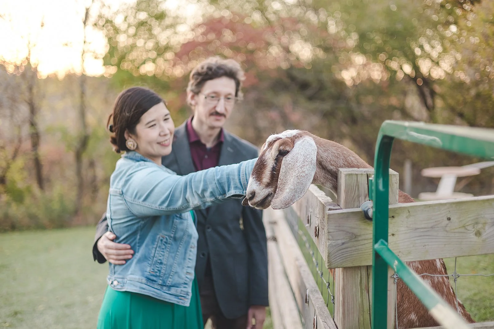 Couple petting goat  Ontario Engagement  Fedora Media.jpg