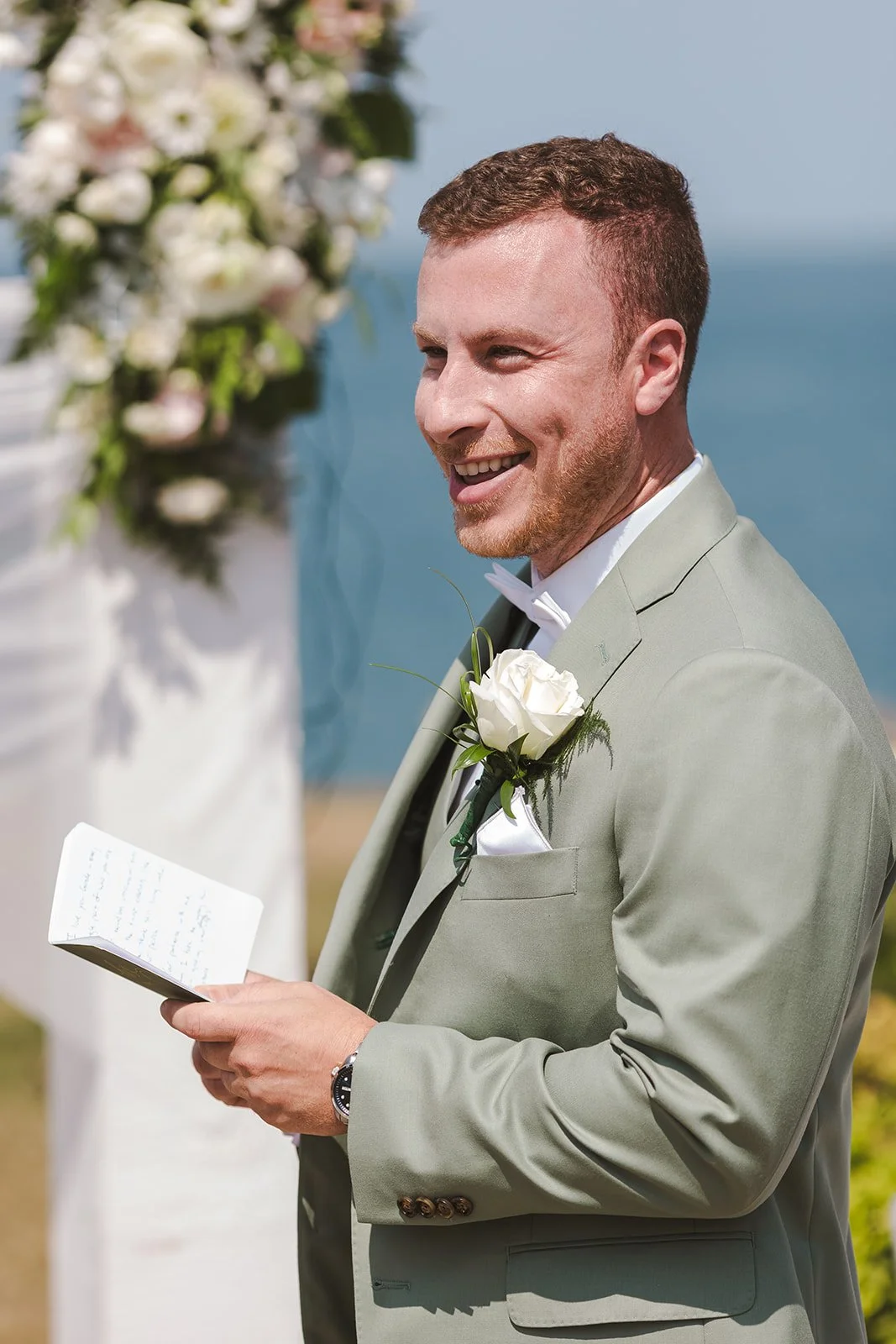 Smiling groom at altar  Hamilton, ON  Fedora Media.jpg