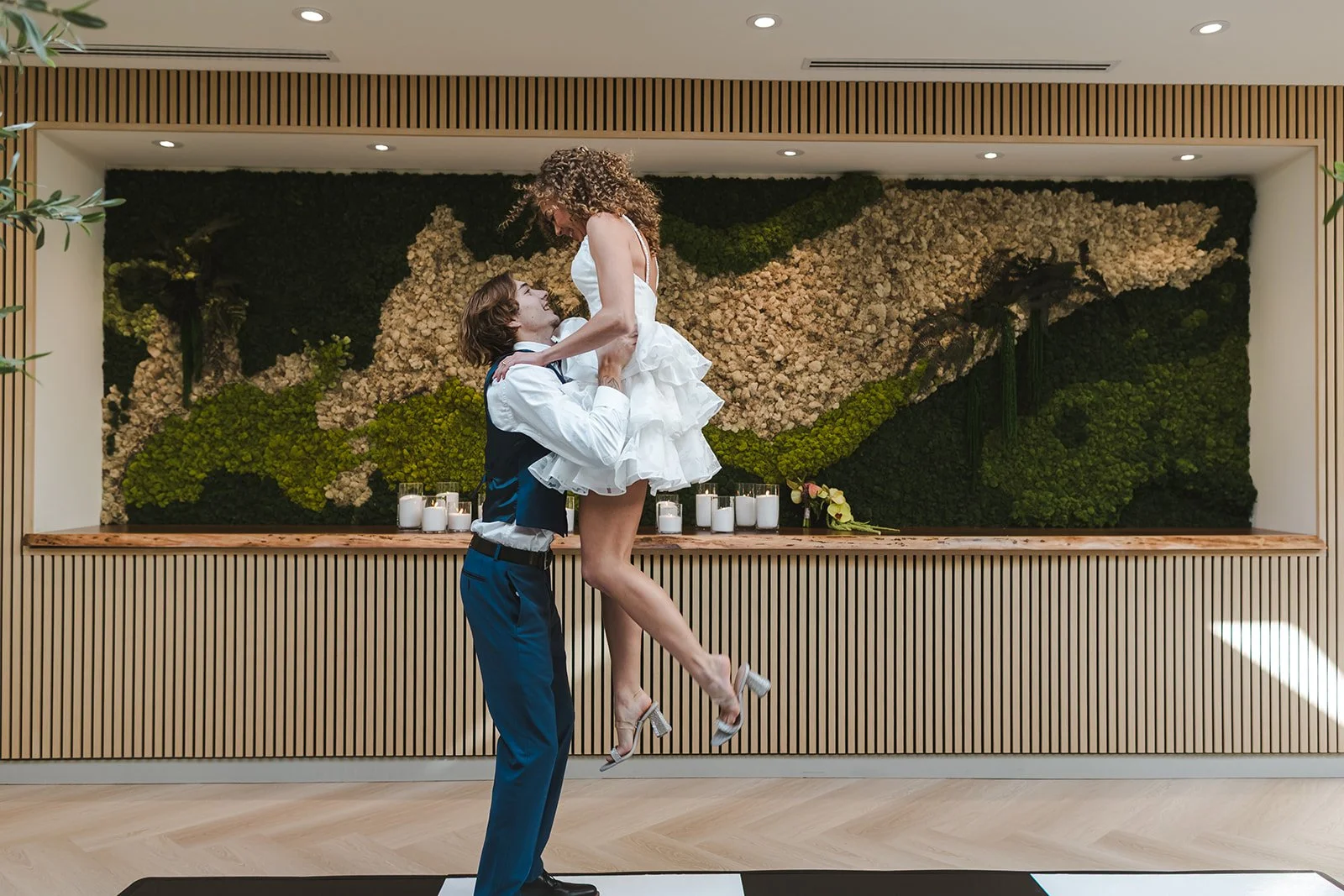 Groom dirty dancing lifts his bride  Urban Jungle  Black Shop Restaurant  Cambridge, ON  Fedora Media.jpg