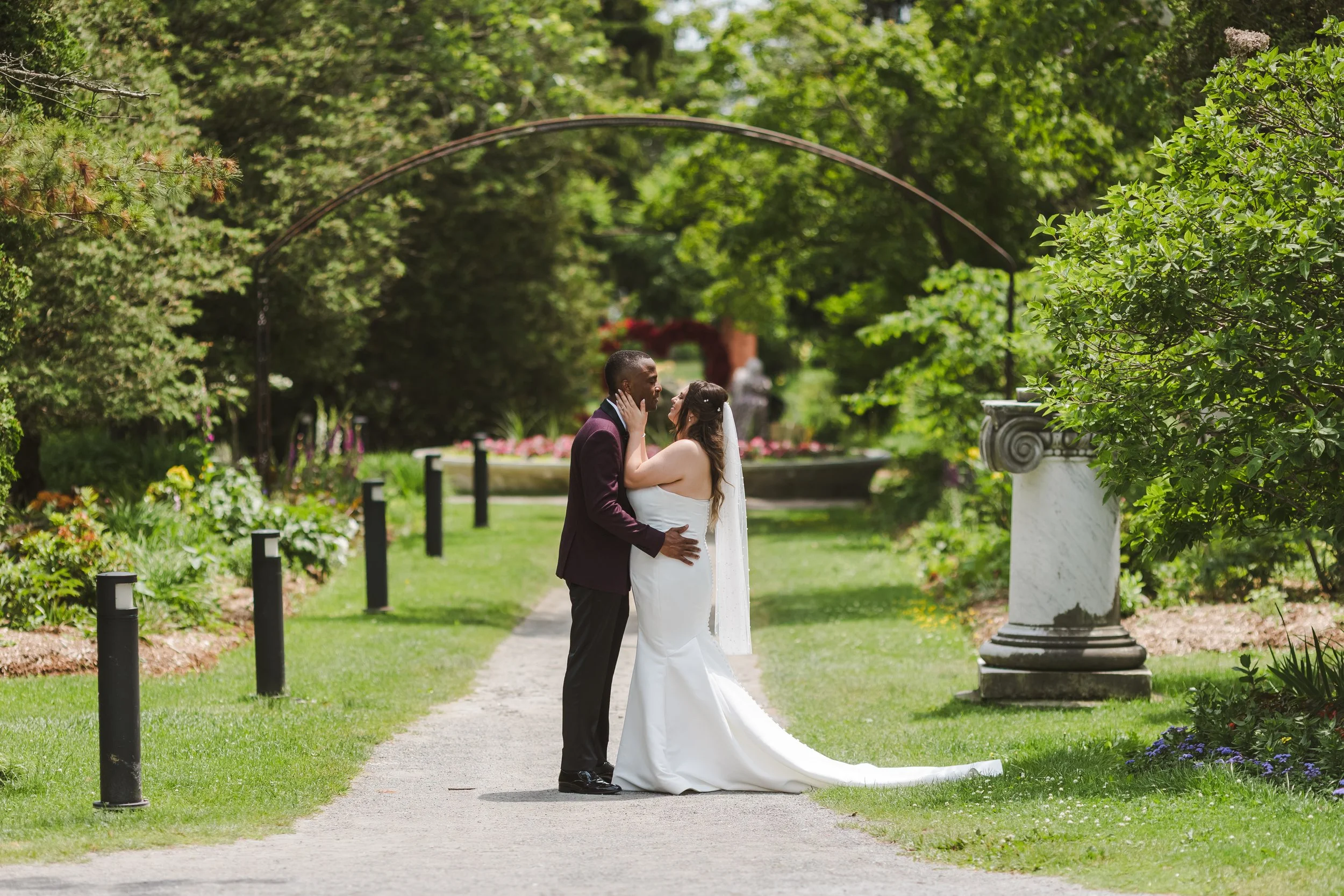 couple-embrace-in-walkway-outdoors-fedora-media.jpg