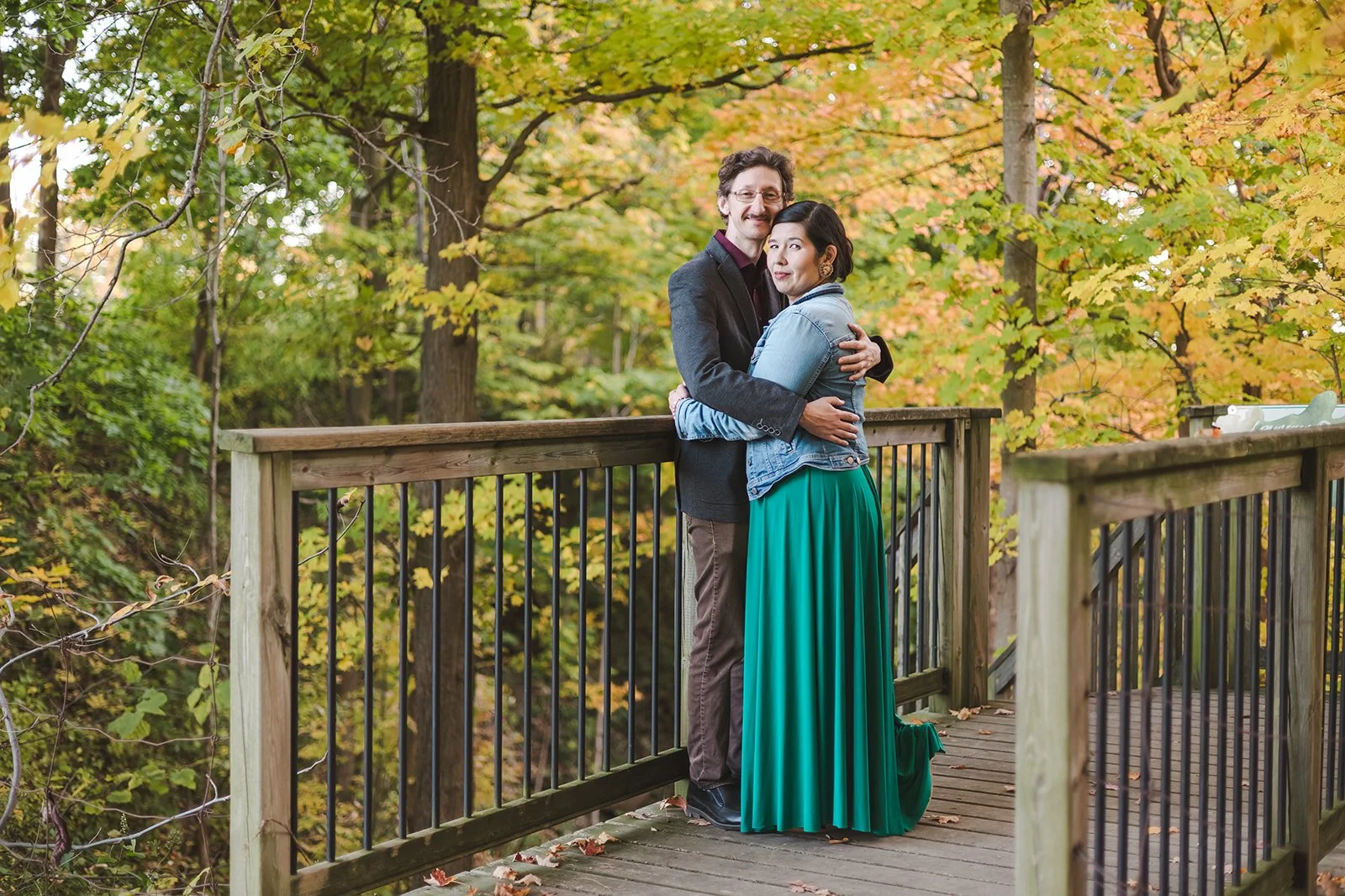 Couple embracing on bridge  Ontario Engagement  Fedora Media.jpg