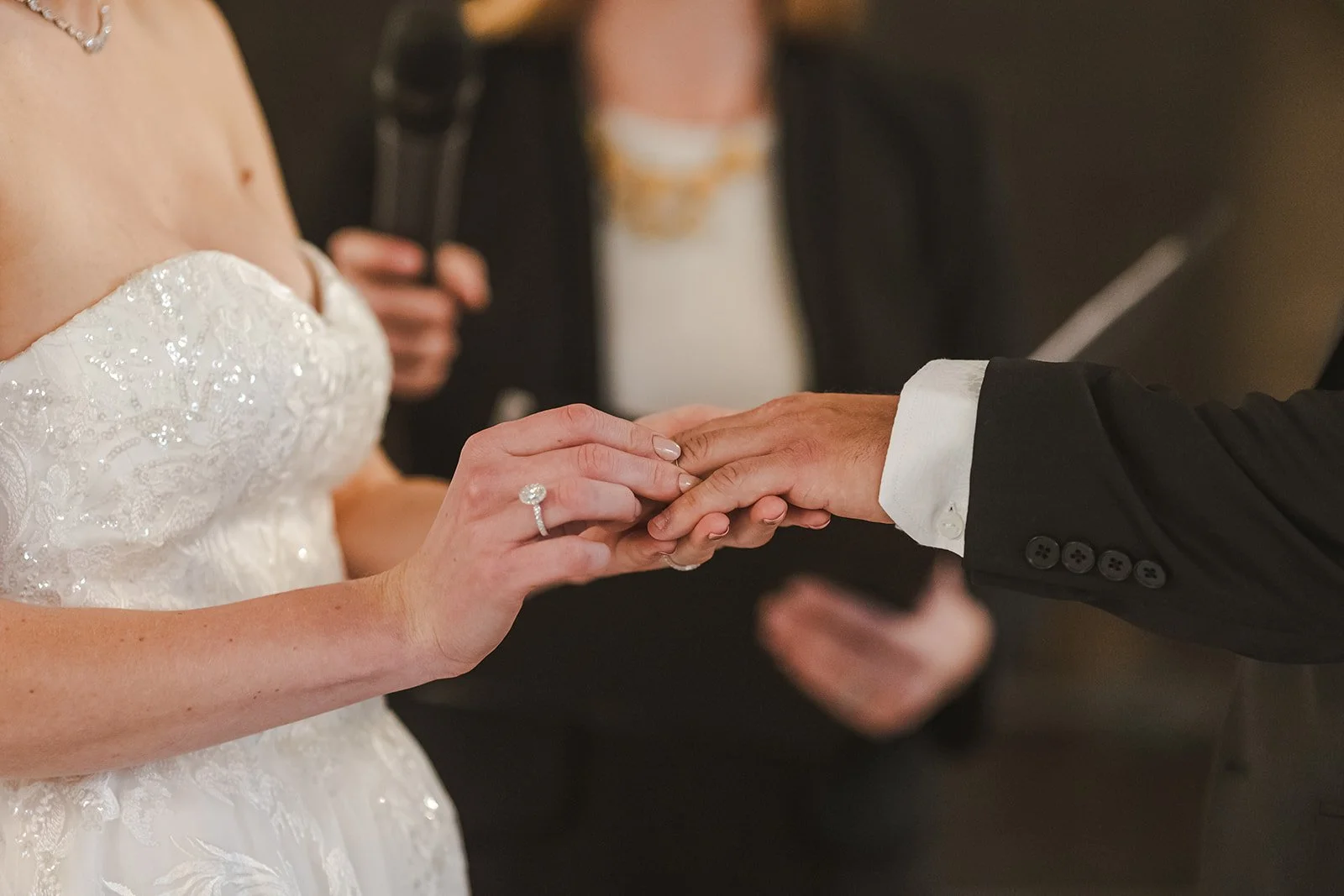 Bride puts ring on grooms finger  Ancaster,  ON  Ancaster Mill  Fedora Media.jpg