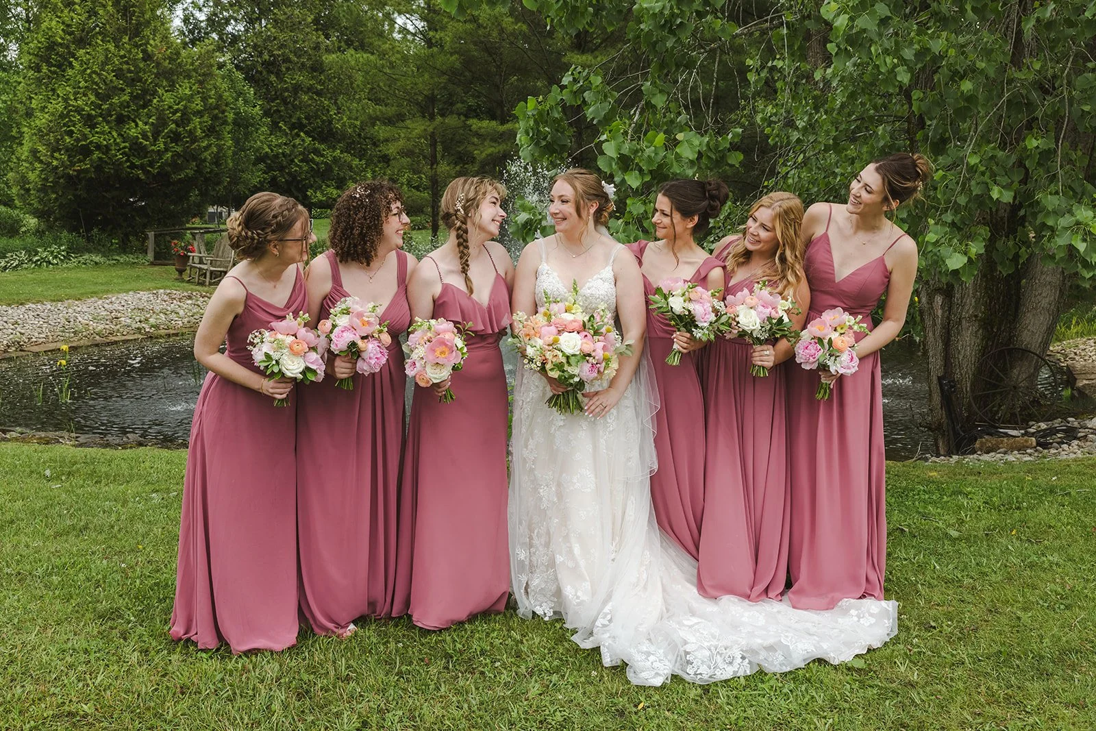 Bride smiling with bridesmaids  Boho Wedding  Fedora Media.jpg