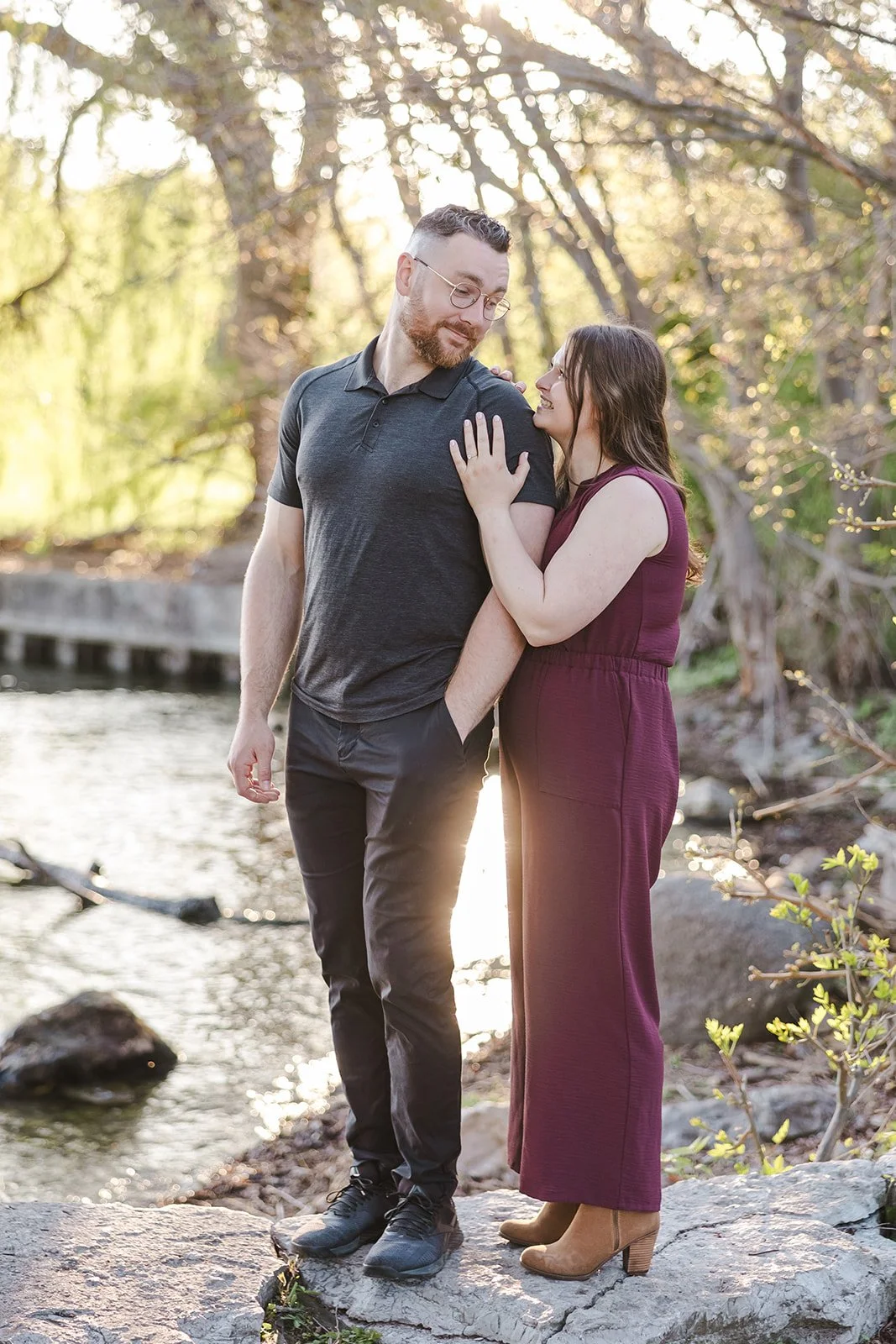 Woman embracing man from behind  Ontario Engagement  Fedora Media.jpg