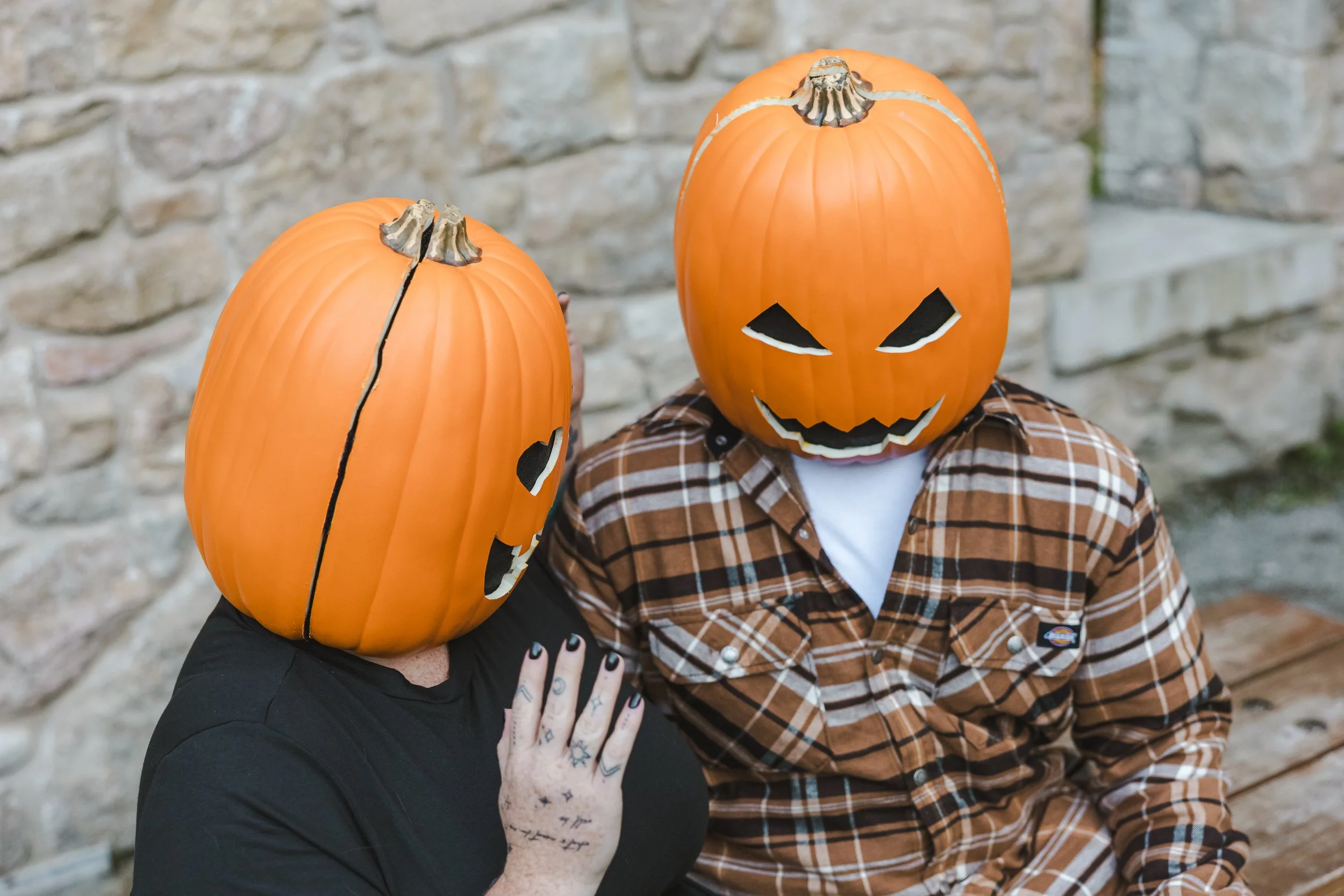 pumpkin-head-people-sitting-on-bench-with-hand-resting-on-shoulder-spooky-shoot-fedora-media.jpg