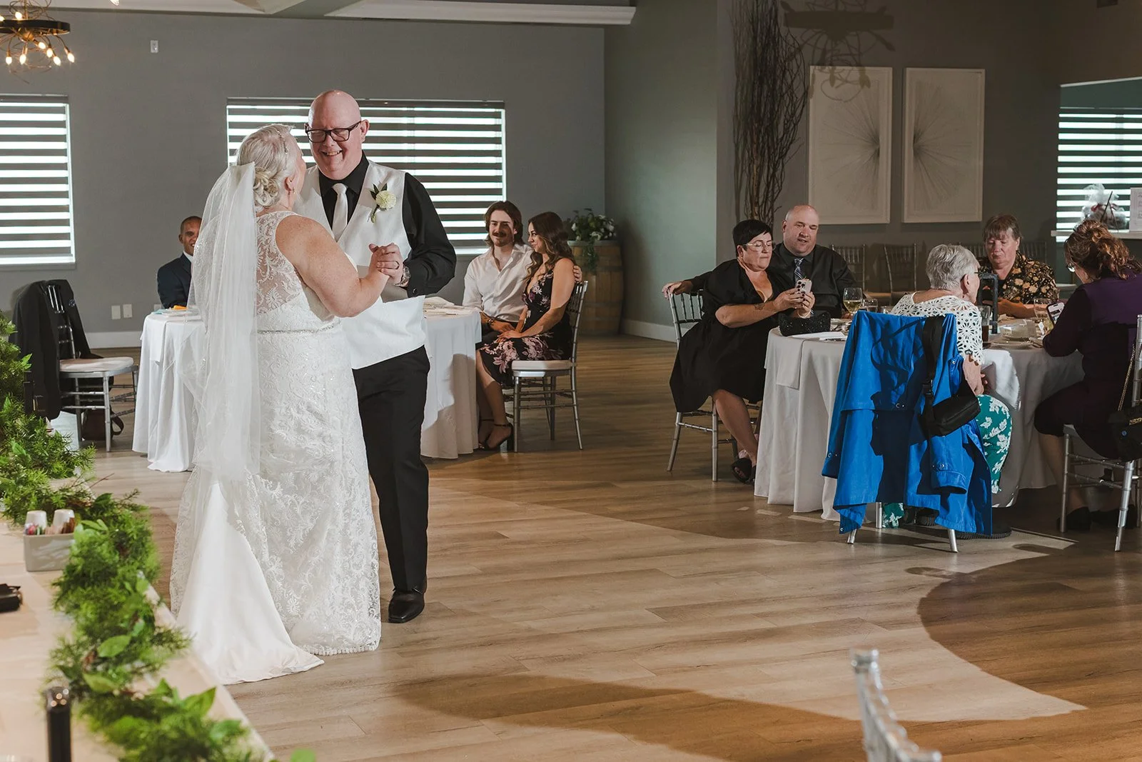 Bride and Groom share first dance on wedding day  Cambridge Hotel  Cambridge, ON  Fedora Media.jpg