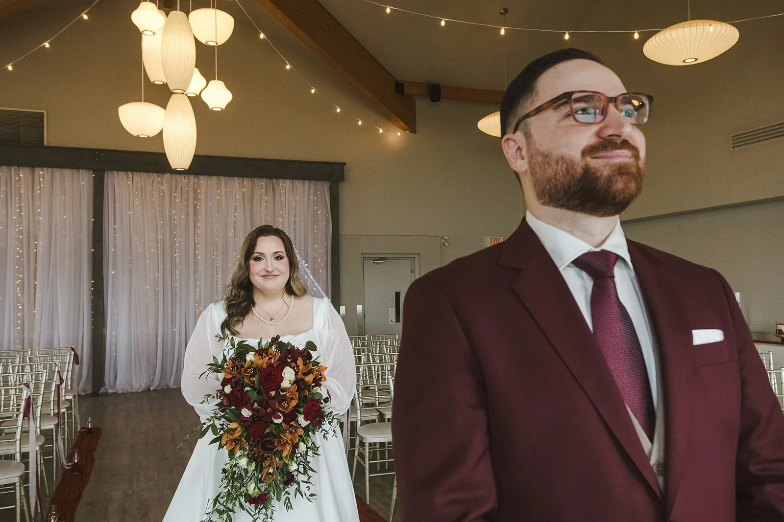 Bride approaching groom at altar from behind  Lakeview By Carmens  Hamilton, ON  Fedora Media.jpg