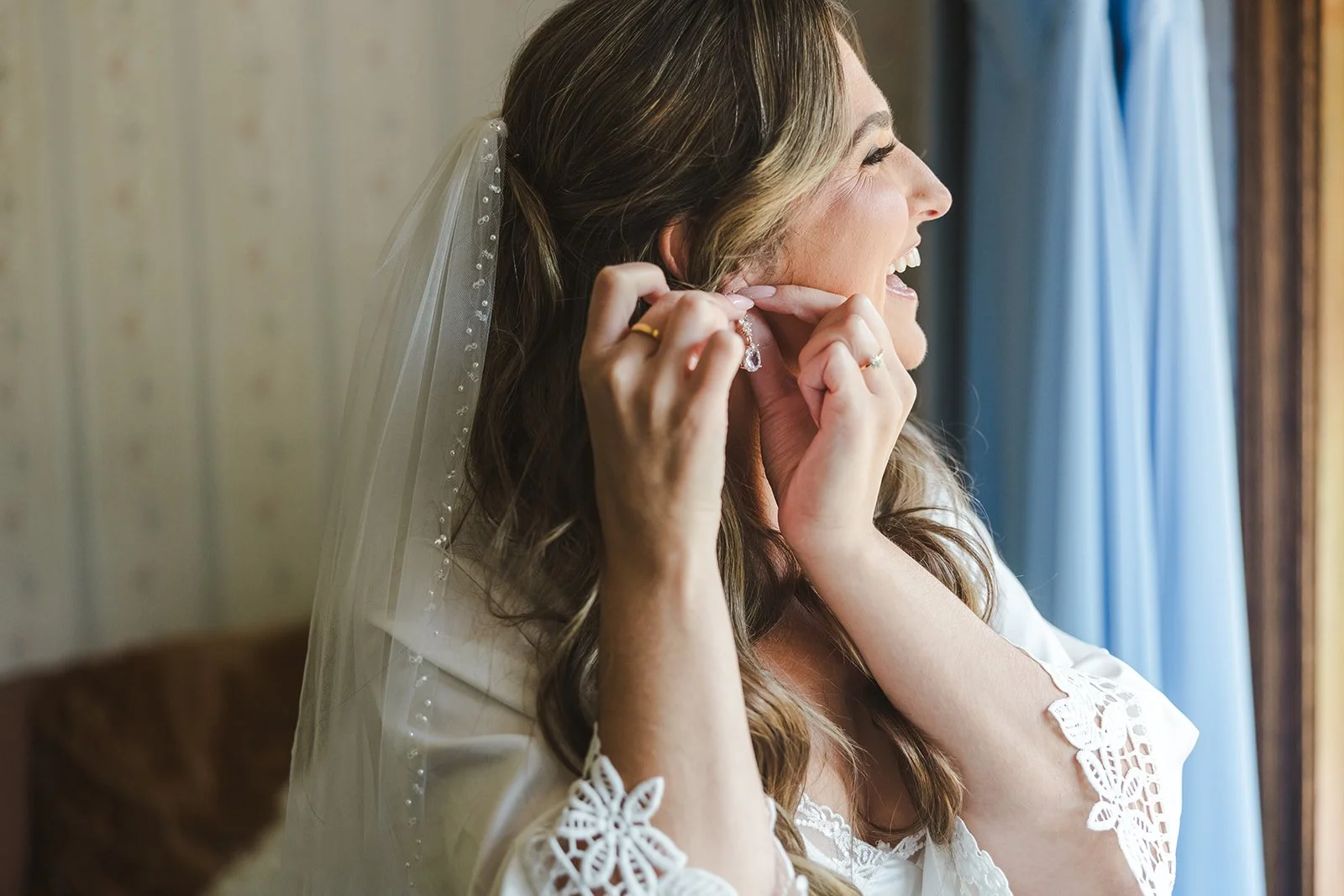 Bride fastening earring  Erin Estates  Fedora Media.jpg