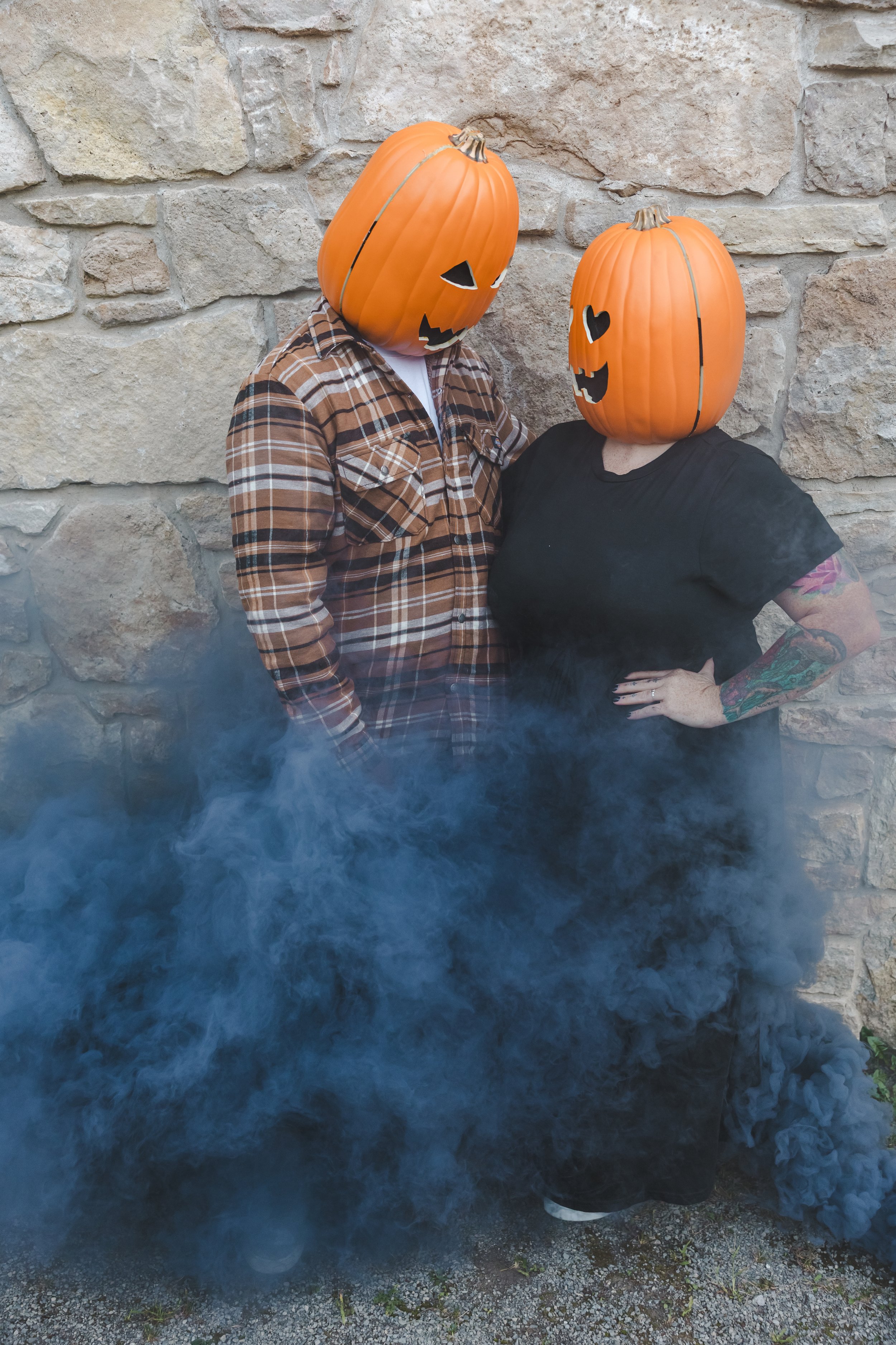 pumpkin-headed-people-standing-in-blue-smoke-spooky-shoot-fedora-media.jpg