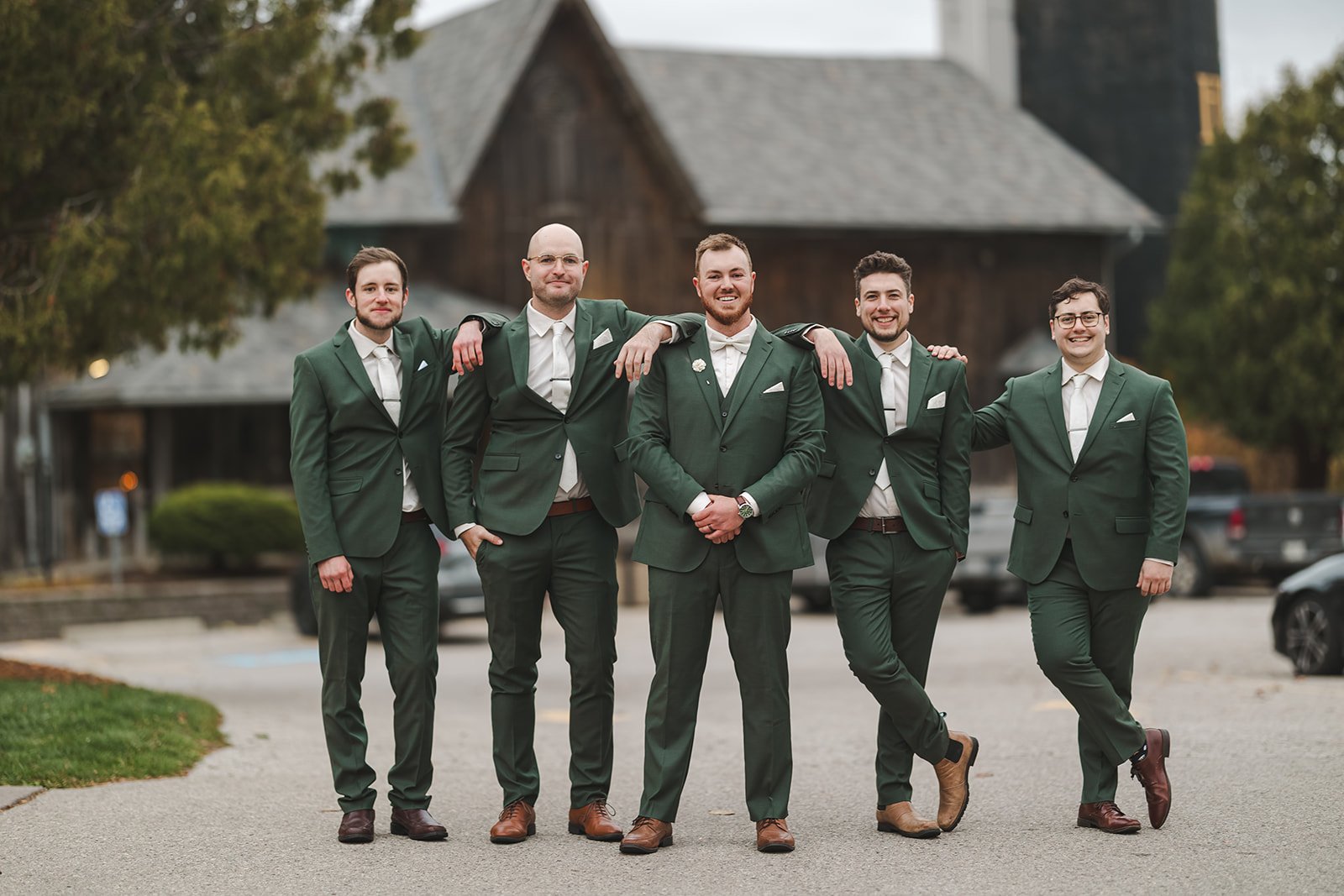 Wedding party leaning on grooms shoulder  fall wedding  Fedora Media.jpg