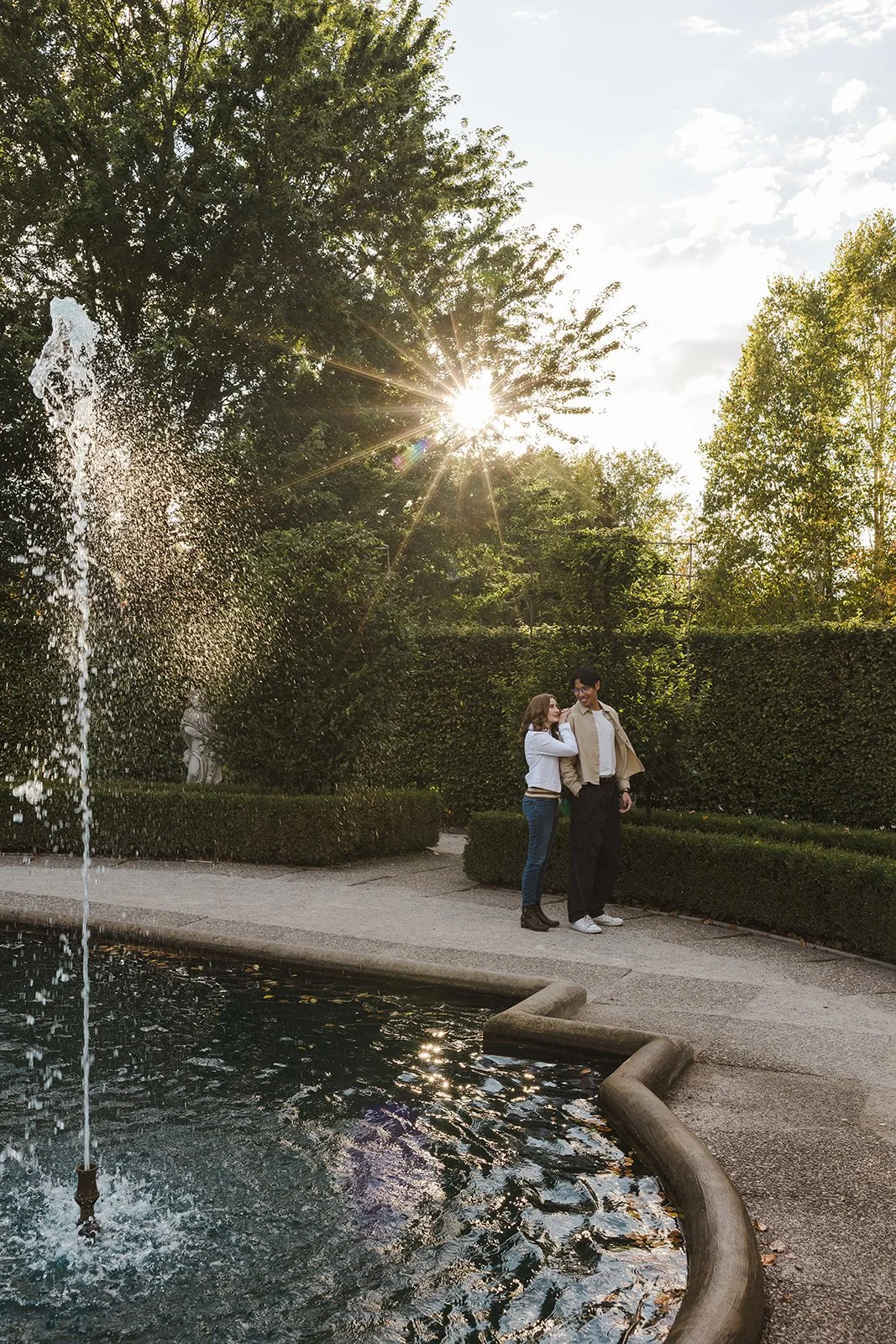 Couple embracing in garden  Ontario Engagement  Fedora Media.jpg