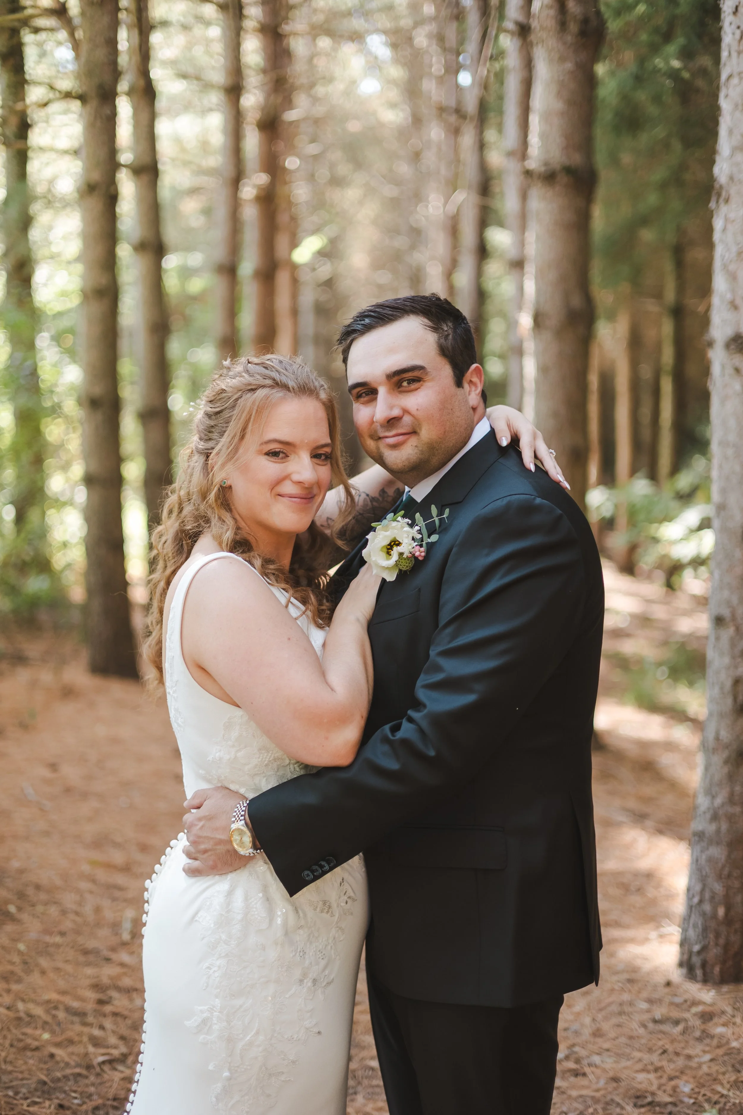 bride-and-groom-hugging-fedora-media.jpg