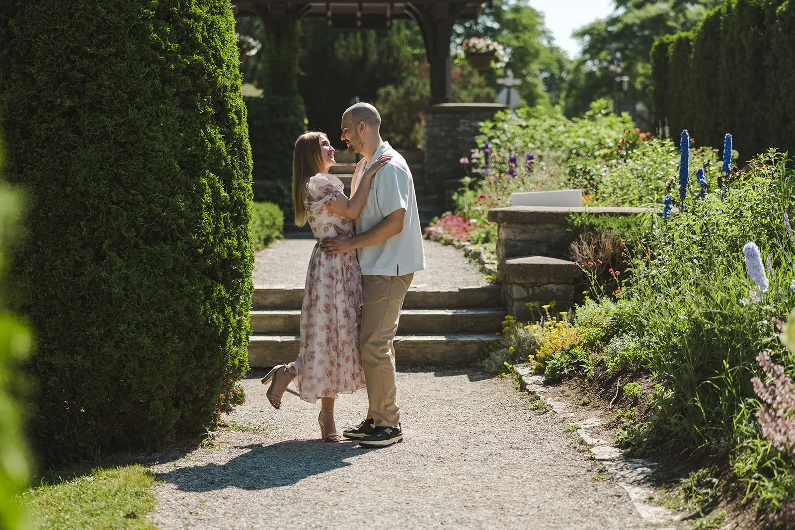 Couple embracing on stone path  Ontario Engagement  Fedora Media.jpg