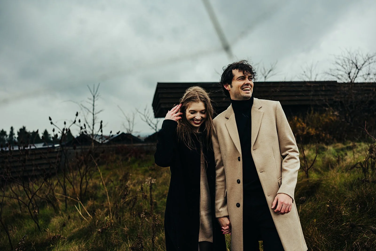 Engaged couple laughing   Fedora Media.jpg