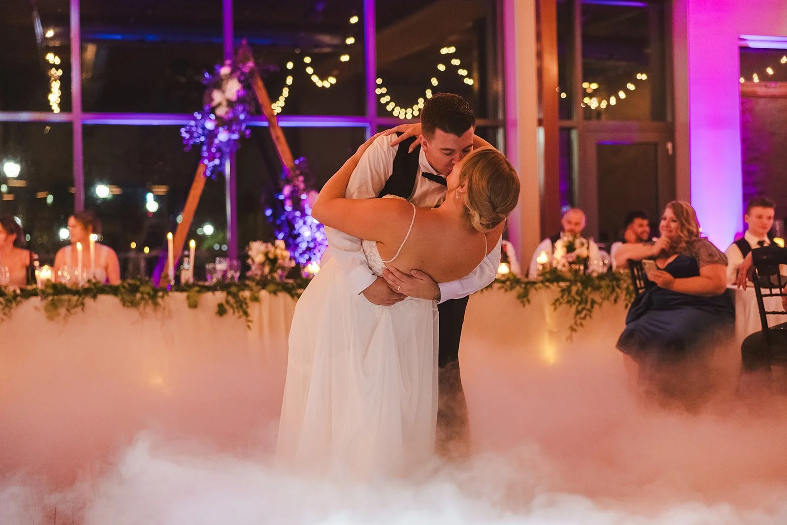 Bride and Groom dip kiss during first dance  Arlington Hotel  River's Edge  Paris, ON  Fedora media.jpg