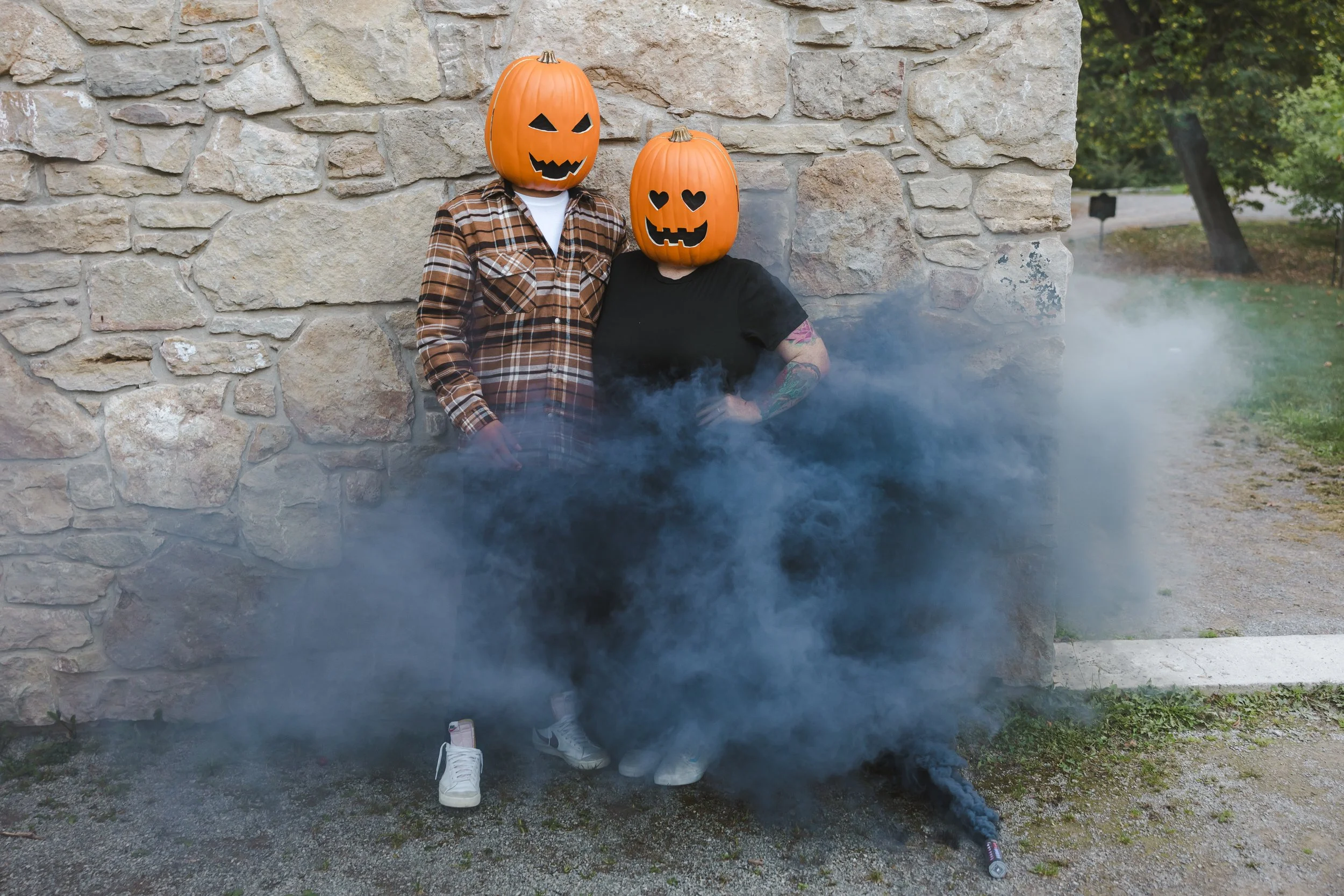 two-people-with-jackolantern-heads-standing-in-smoke-spooky-shoot-fedora-media.jpg
