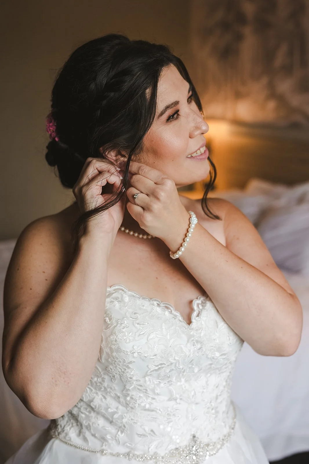Bride putting on earrings  Hamilton, ON  Glen Drummond Farm  Fedora Media.jpg