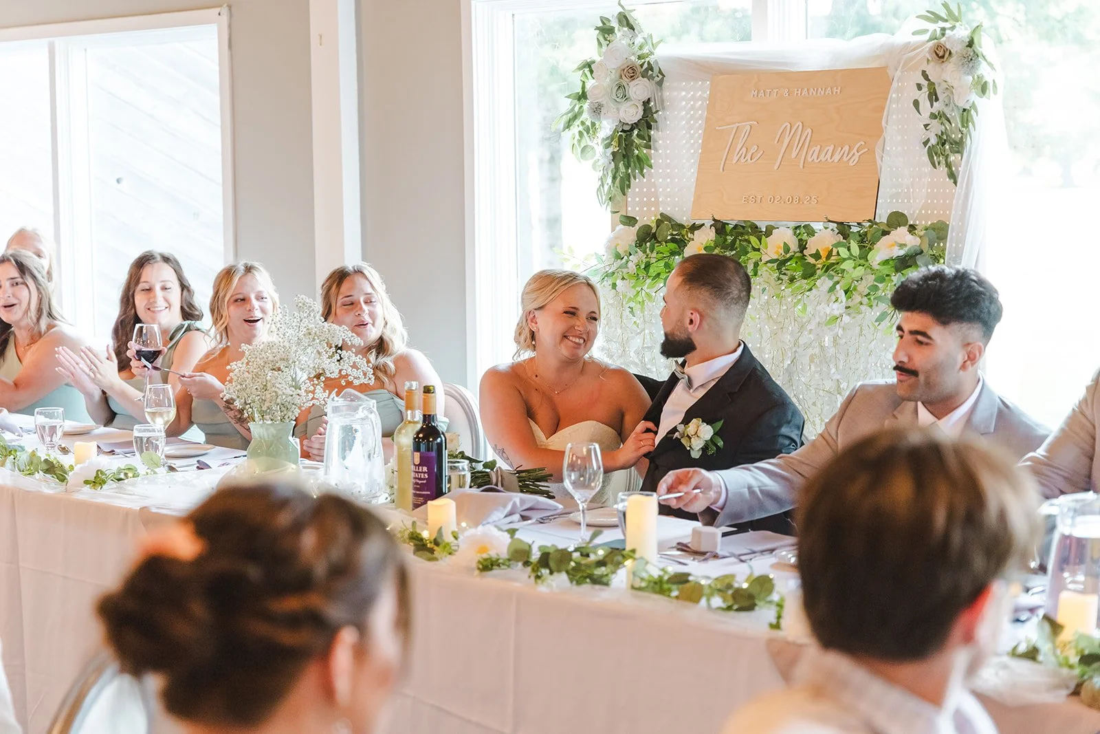 Bride and groom intimate moment at head table Dundee Golf & Country Club  Fedora Media.jpg