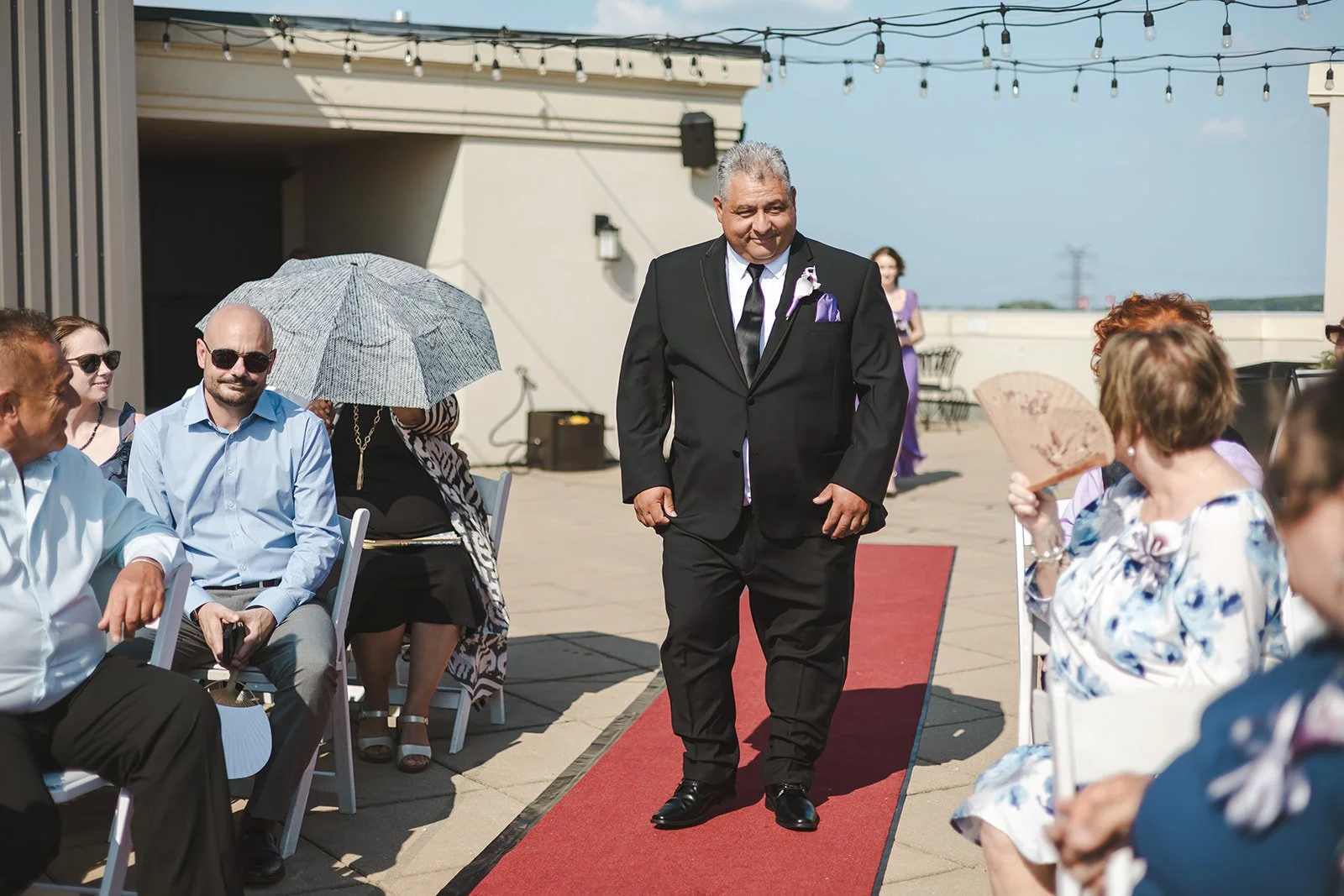 Groom walking down aisle  Hamilton, ON  Carmen's Hotel  Fedora Media.jpg