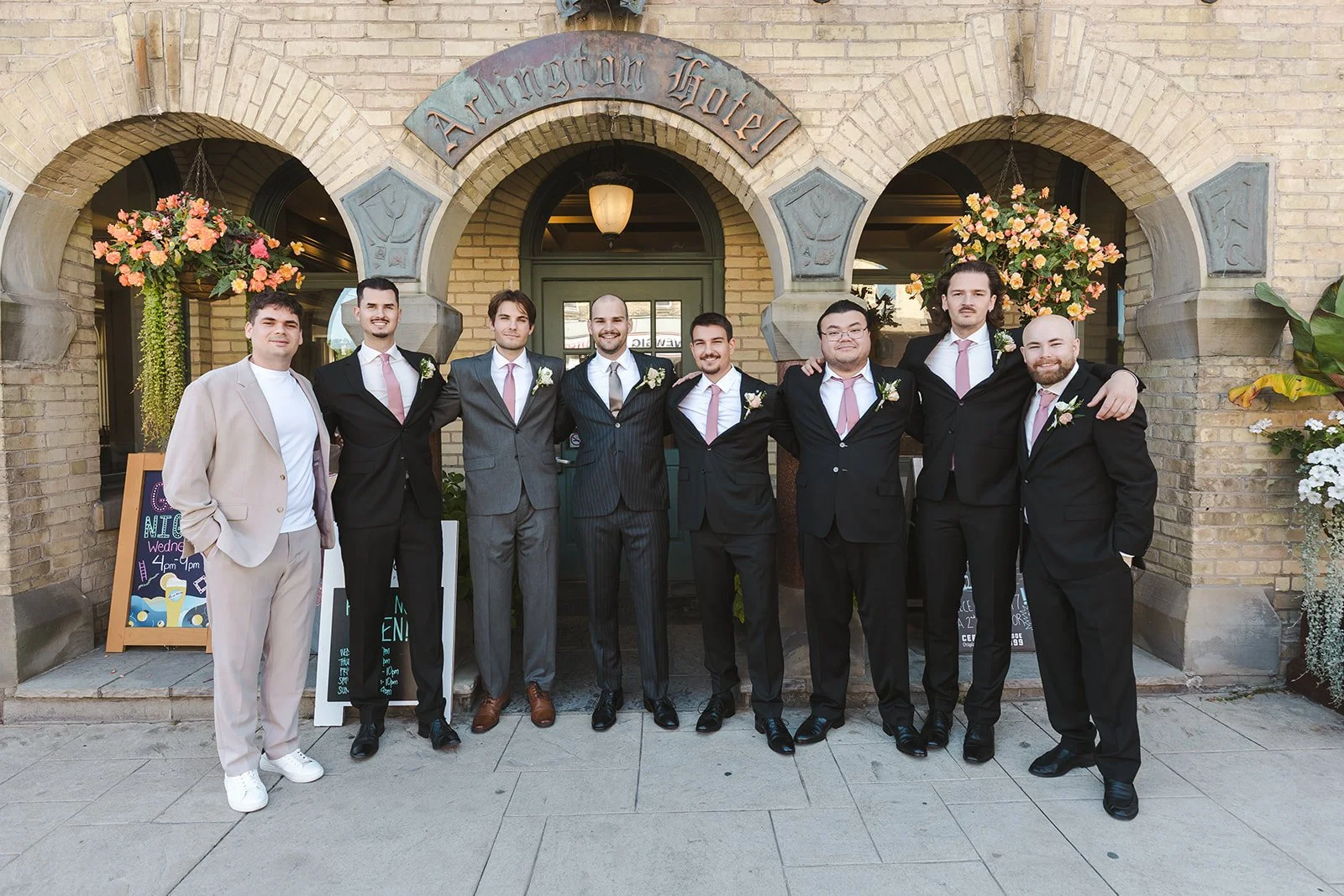 Groomsmen in front of hotel  Paris, ON  Arlington Hotel  River's Edge  Fedora Media.jpg