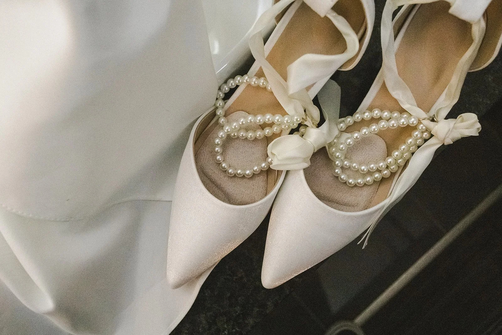 Bridal shoes and dress  Lakeview By Carmens  Hamilton, ON  Fedora Media.jpg