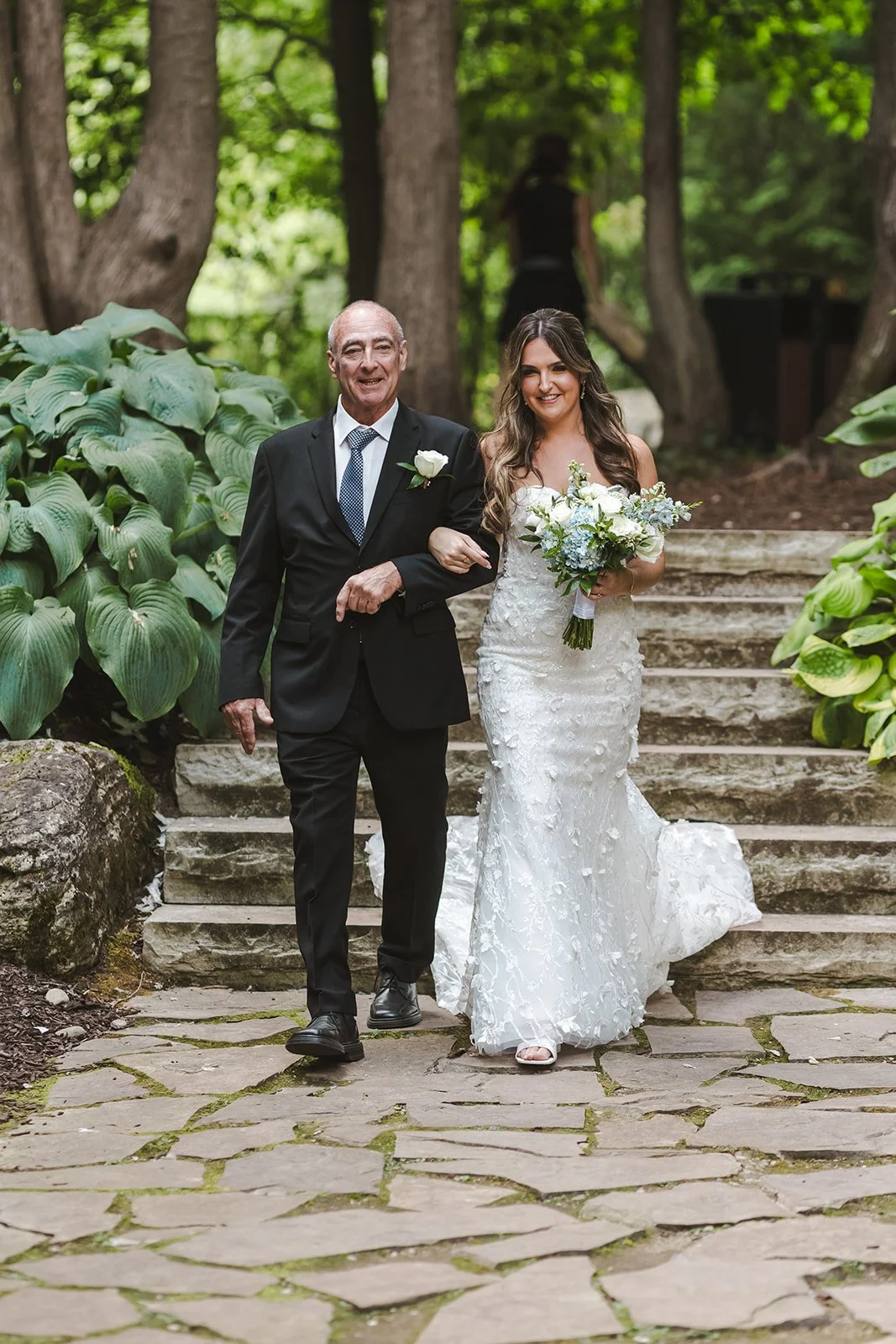 Bride and father walking down aisle as seen by groom  Erin Estates  Fedora Media.jpg