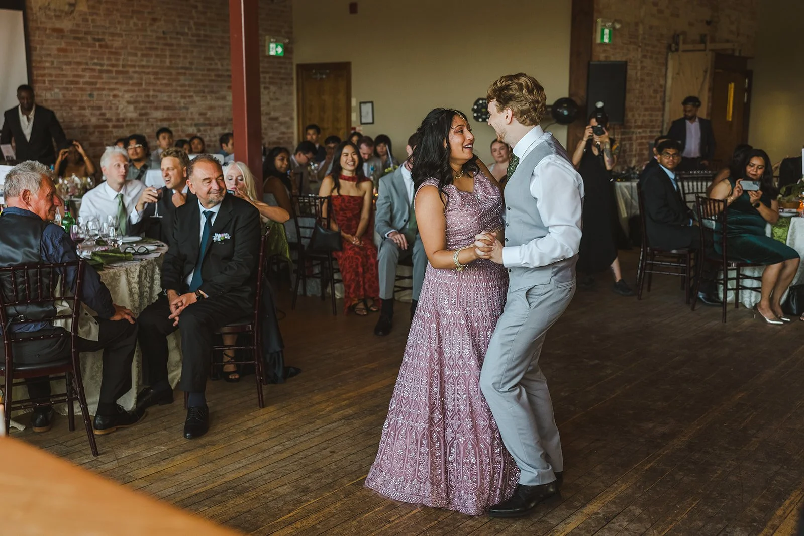 Bride and groom first dance guests watching  River's Edge  Arlington Hotel  Paris, ON  Fedora Media .jpg