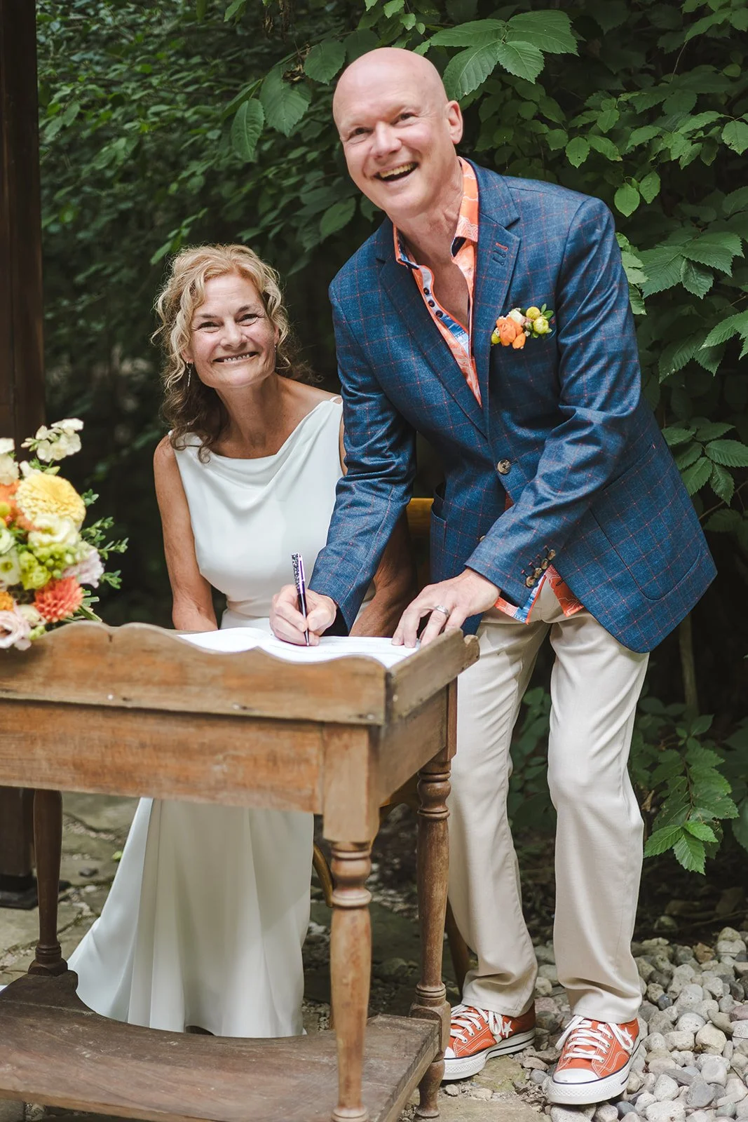 Bride and groom signing marriage certificate  Erin Estates  Fedora Media.jpg