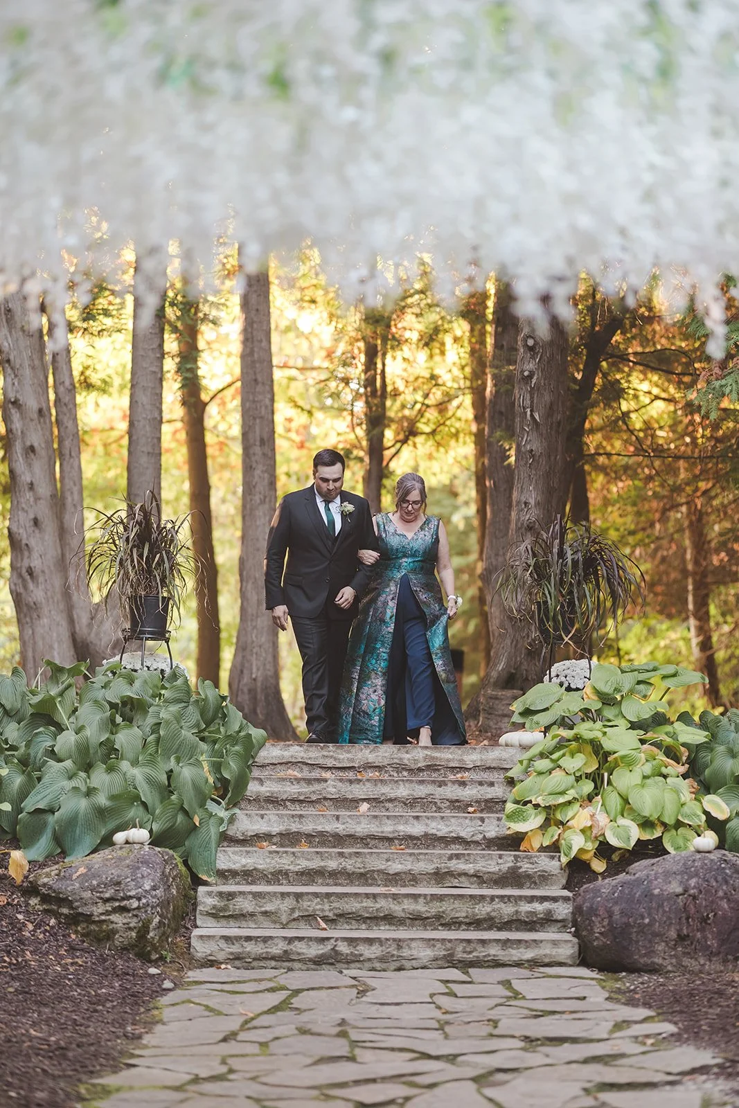 Groom and mother walking down aisle  Erin Estates  Fedora Media.jpg