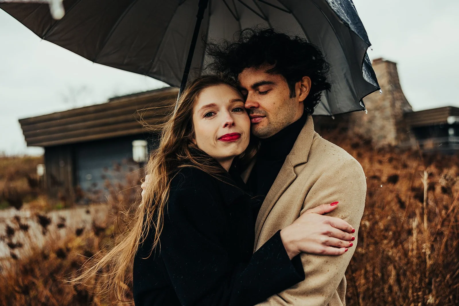 Engaged couple hugging  Fedora Media.jpg
