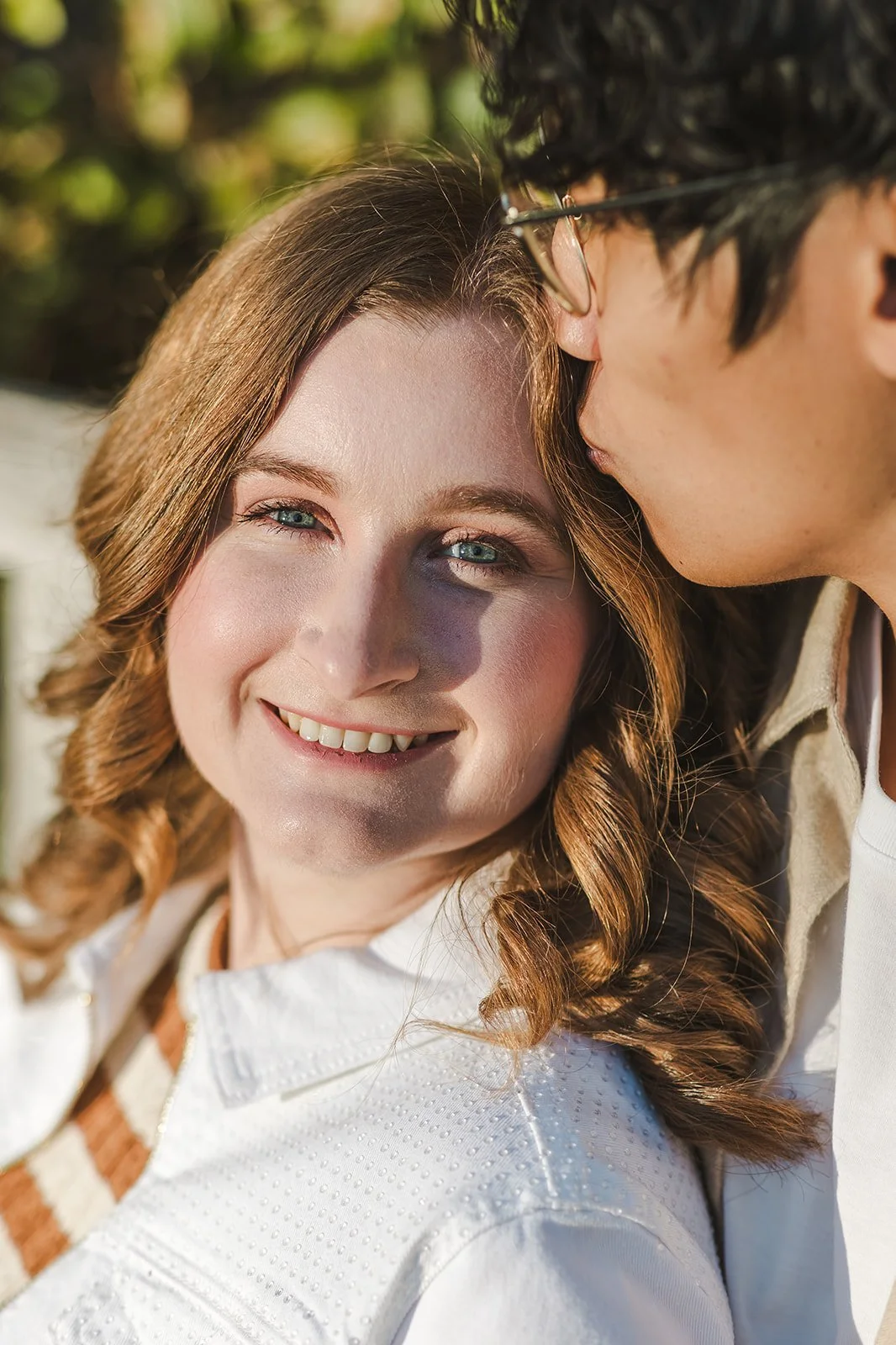 Woman smiling with blue eyes  Ontario Engagement  Fedora Media.jpg