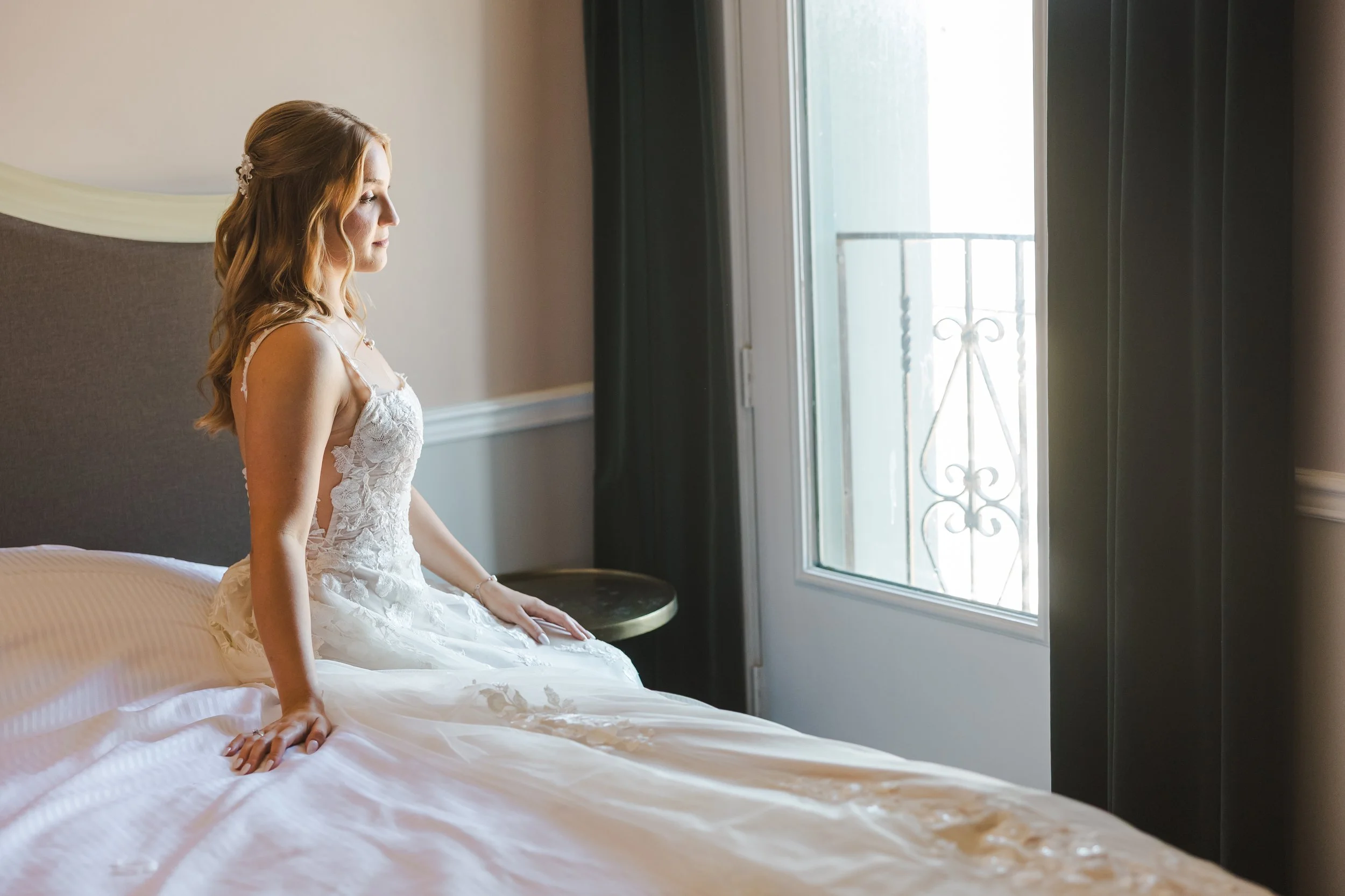 bride-sitting-on-bed-fedora-media.jpg