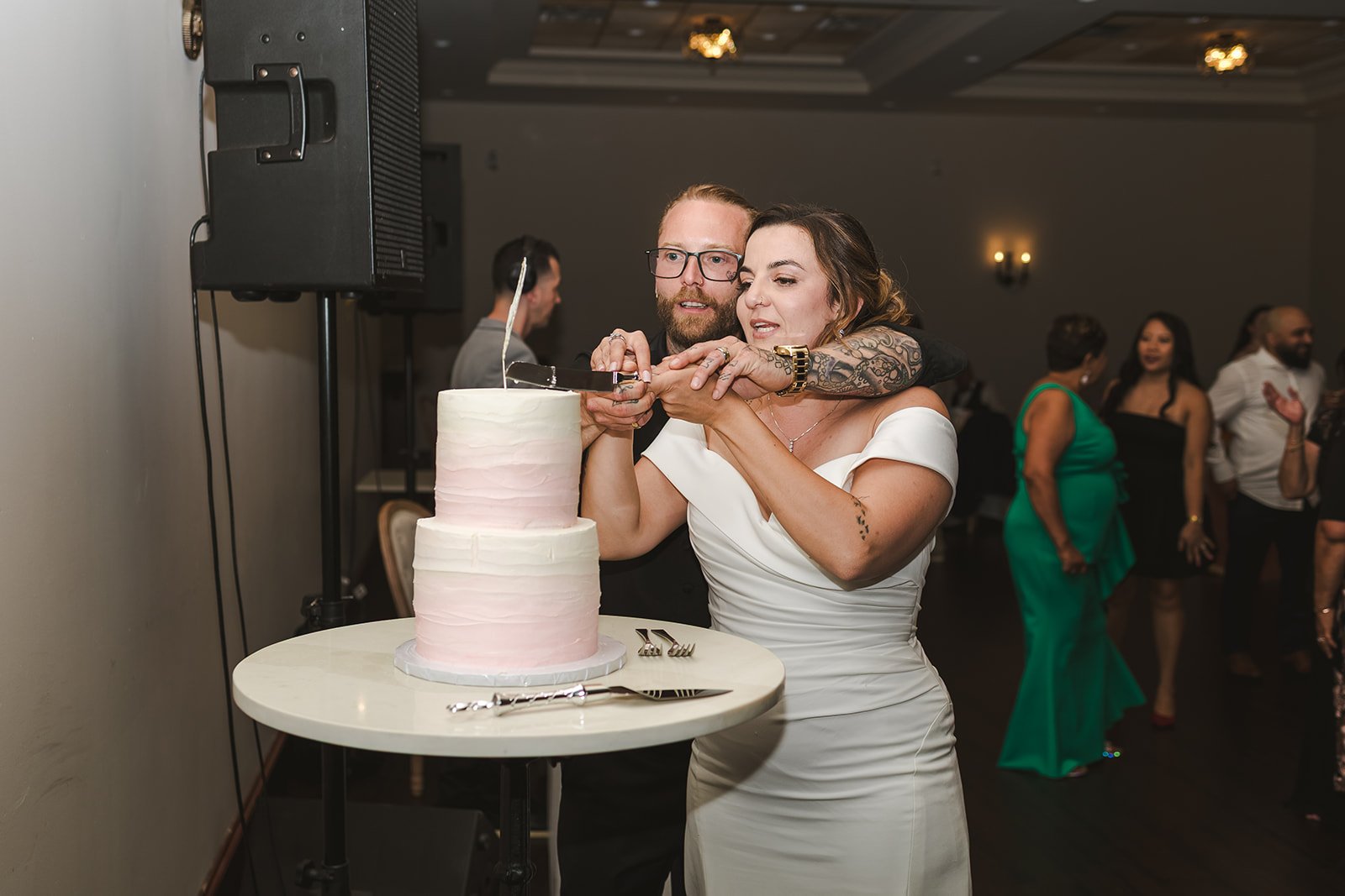 Bride and groom cutting wedding cake  Puddicombe House  New Hamberg, ON  Fedora Media.jpg