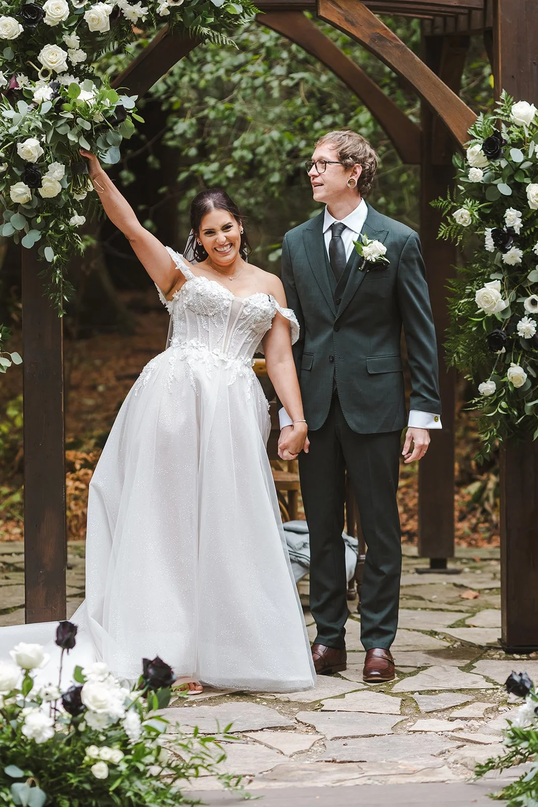 Bride and groom at altar facing crowd  Erin Estates  Fedora Media.jpg