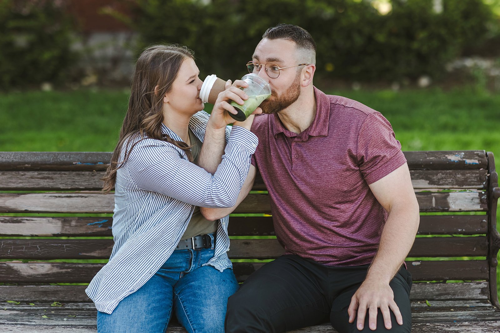 Couple drinking coffee on park bench  Ontario Engagement  Fedora Media.jpg