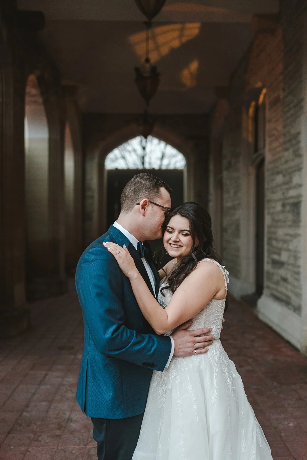 bride-and-groom-embracing-fedora-media.jpg