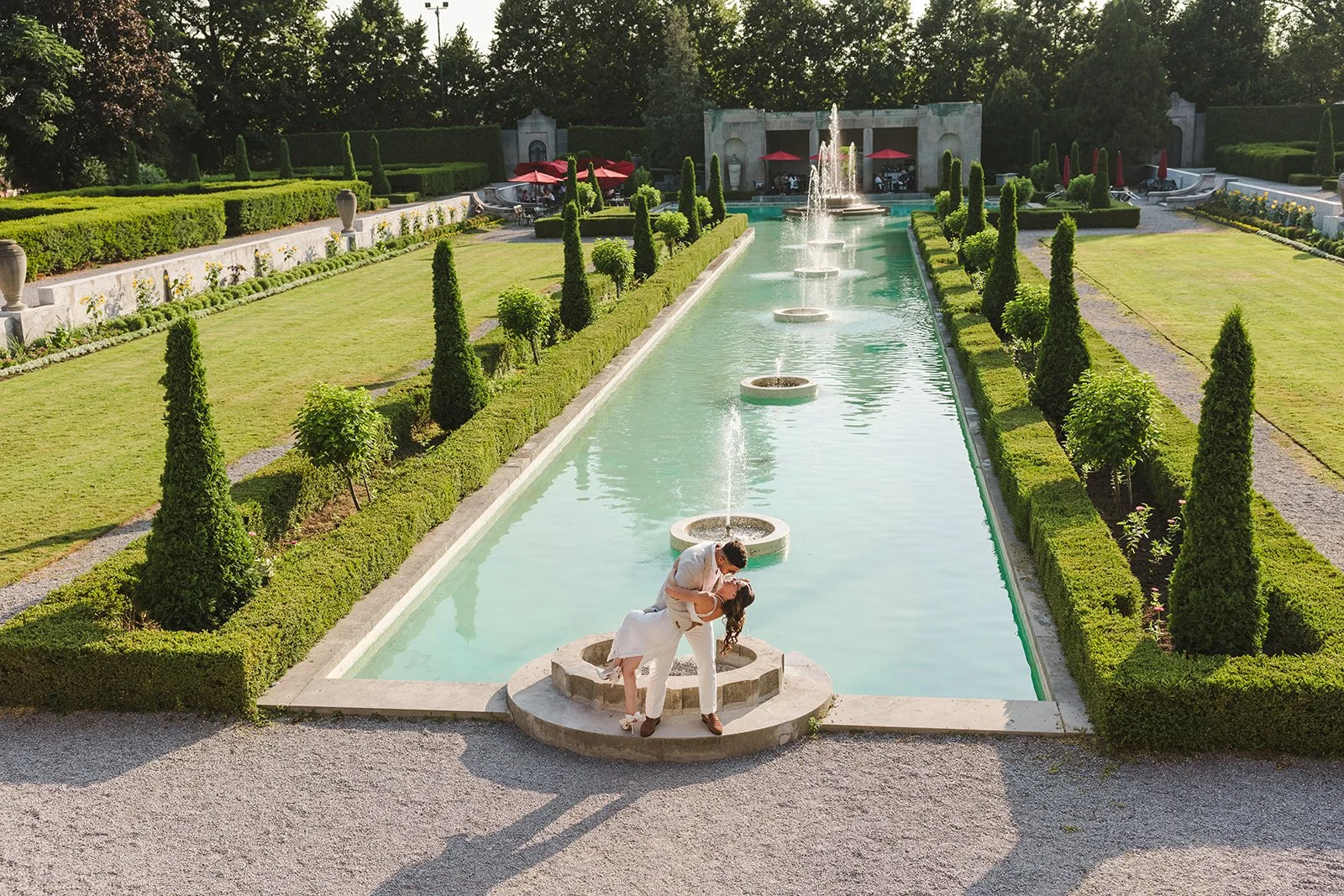 Drone angle of couple embracing in a dip kiss  Ontario Engagement  Fedora Media.jpg