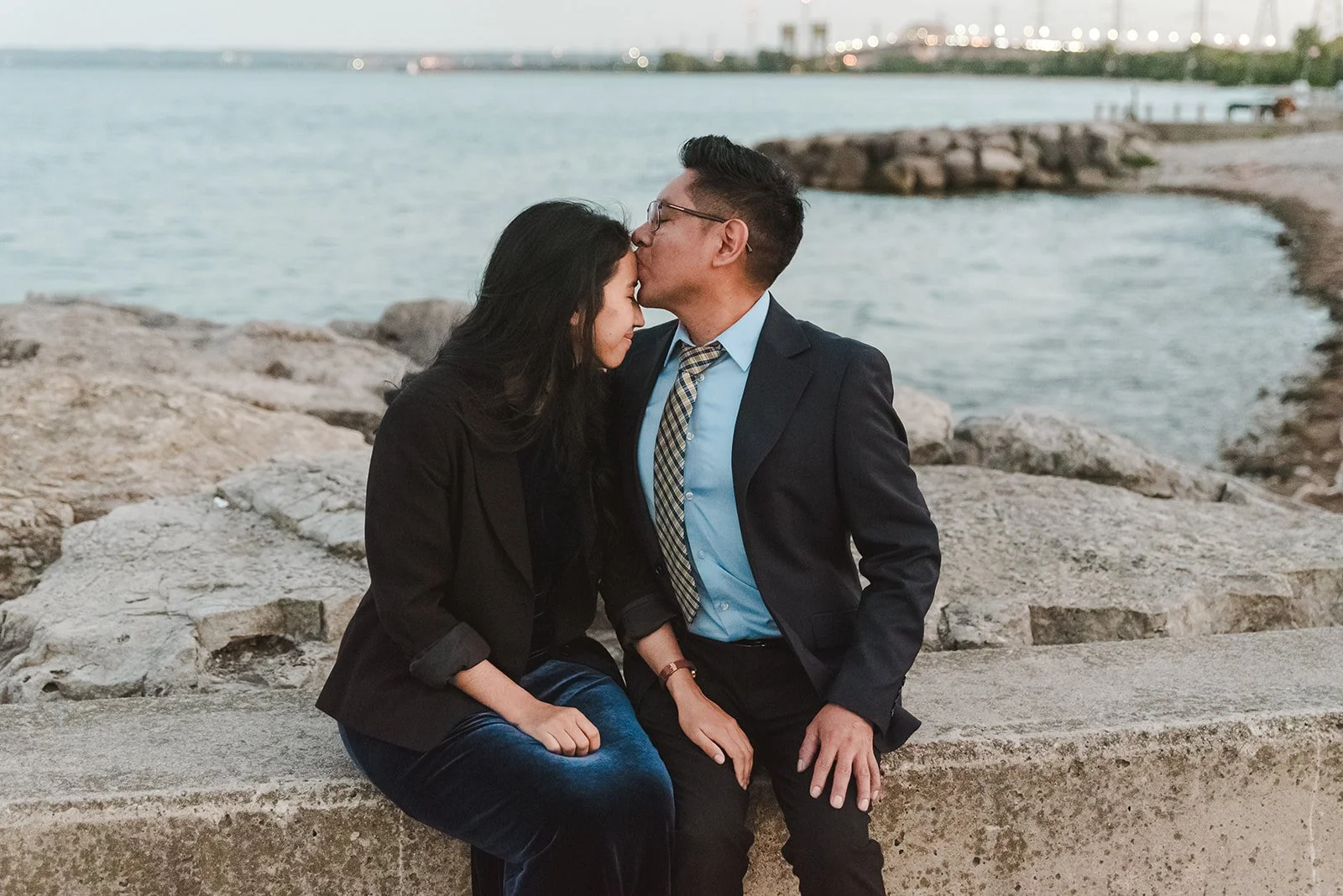 Man kisses fiancee's forehead after proposal  Burlington, ON  Proposal  Fedora Media.jpg