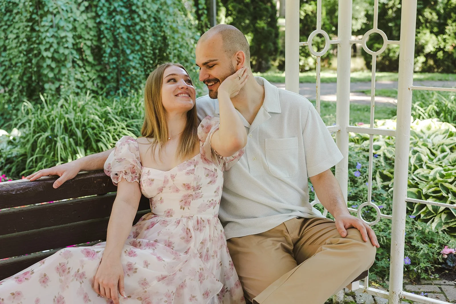Woman sitting with man grabbing his face  Ontario Engagement  Fedora Media.jpg