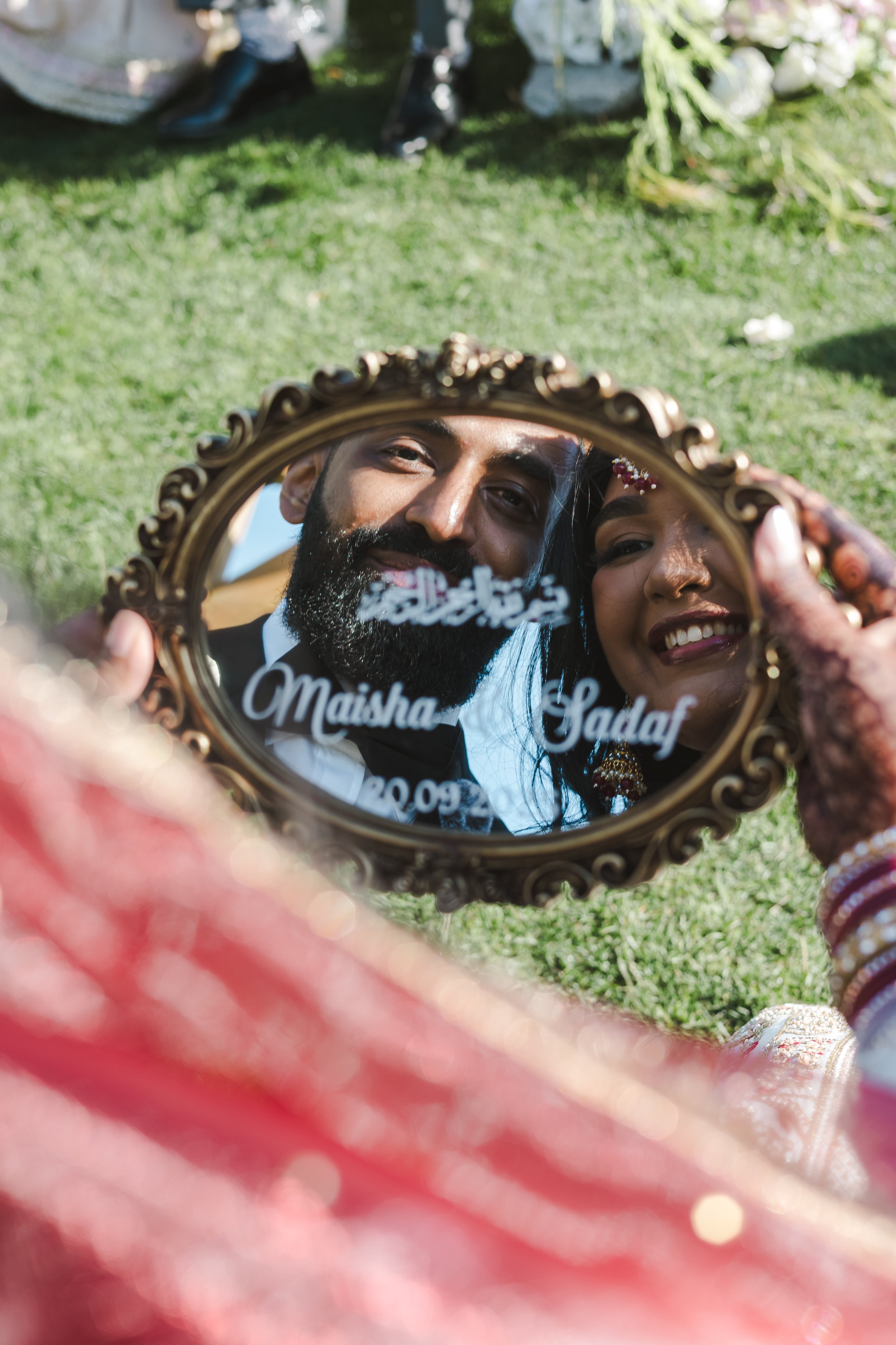 bride-and-groom-in-mirror-photo-fedora-media.jpg