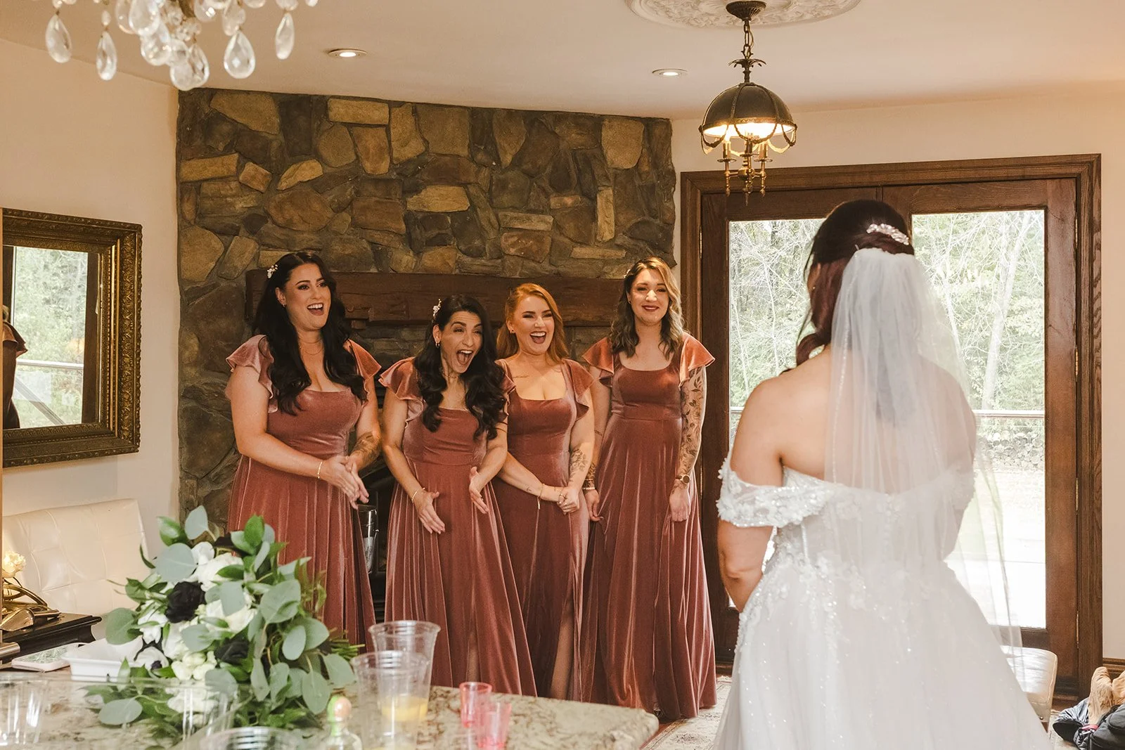 Bridesmaids seeing bride in dress for the first time  Erin Estates  Fedora Media.jpg