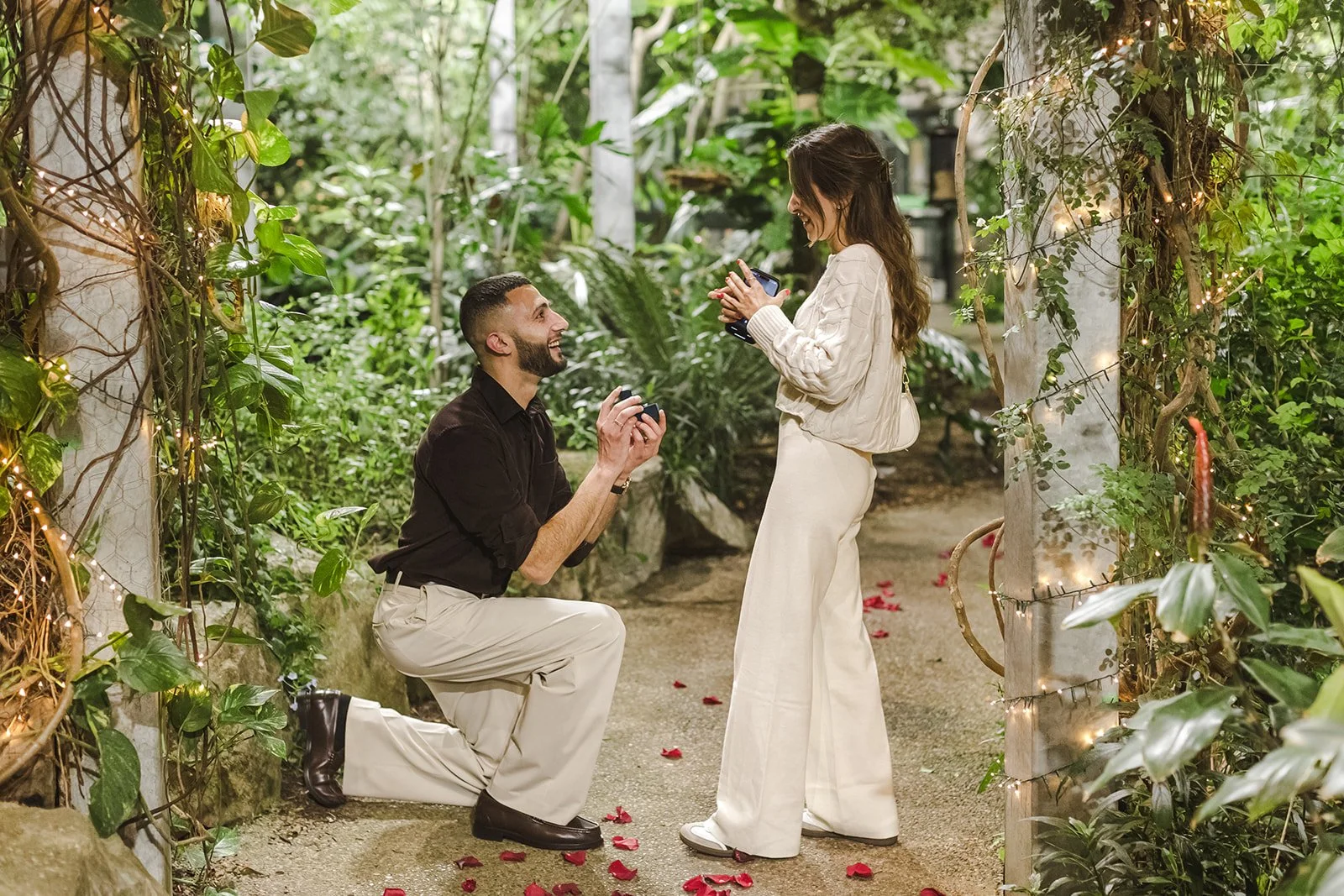 Man down on one knee proposing  Proposal  Cambridge Butterfly Conservatory  Cambridge, ON  Fedora Media.jpg