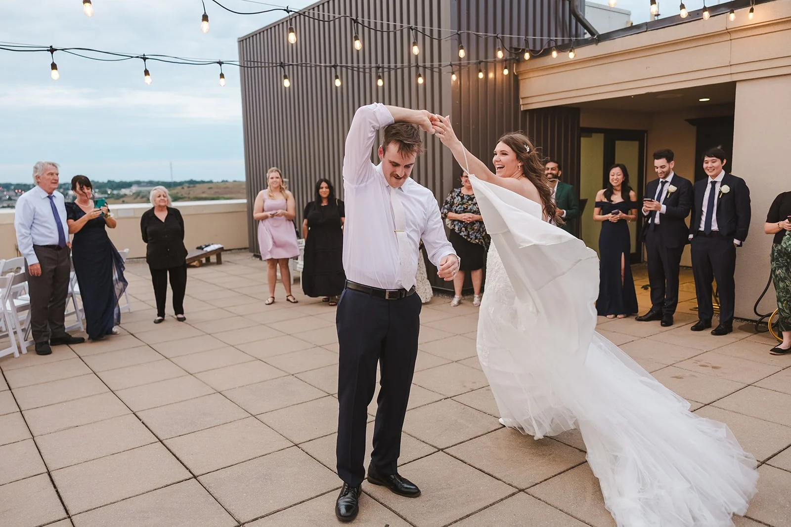 Bride and groom dancing on rooftop  Carmen's Hotel  Hamilton, ON  Fedora Media.jpg