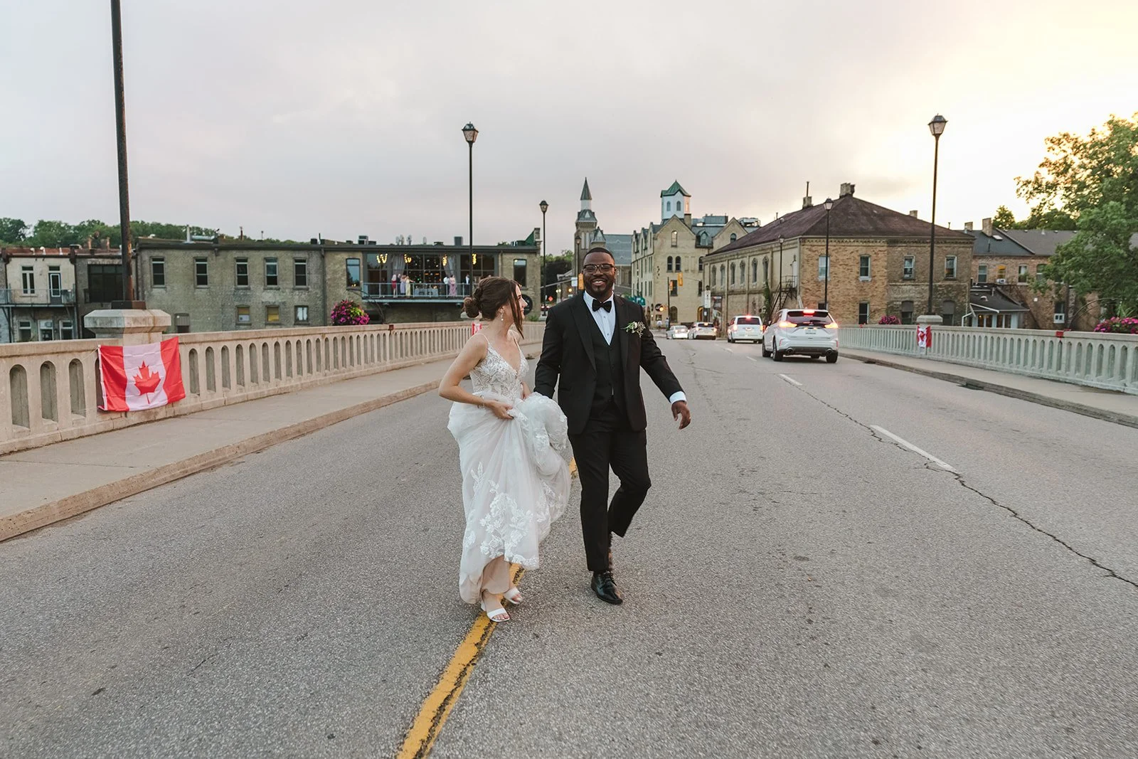 Bride and groom crossing the street  River's Edge  Arlington Hotel  Paris, ON  Fedora Media.jpg